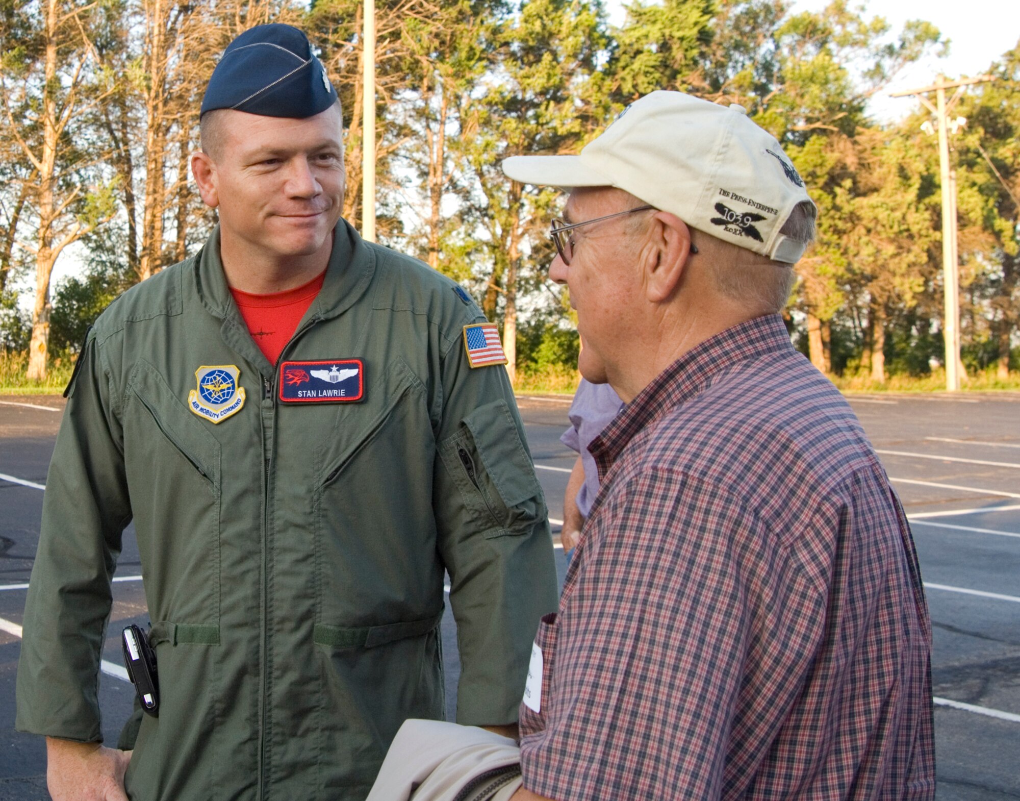 Lt. Col. Stan Lawrie, 22nd Air Refueling Wing safety chief, talks with a Clark Sholts, McConnell neighboring landowner, before an orientation flight in a KC-135 Stratotanker July 9, 2010, Wichita, Kan.  McConnell held a Landowner’s Appreciation Flight to thank neighboring landowners for their support for McConnell’s Bird Aircraft Strike Hazard program.  The BASH program has helped the base reduce bird strikes by one third.  (U.S. Air Force photo/Senior Airman Abigail Klein)