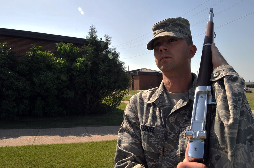 MINOT AIR FORCE BASE, N.D. -- Airman 1st Class Ryan Ferree, 5th Munitions Squadron munitions systems apprentice and member of the Minot AFB Honor Guard, is from Ephraim, Utah. He entered the Air Force in September 2009. Airman Ferree said his career goals have always been to join the Air Force. As an “AMMO” troop, he said, “We maintain, build and deliver the fire power to the aircraft.” One of his favorite memories was the first time he saw a B-52 fly over head. He recounts the memory as, “Amazing.” He spends his off-time with his wife and two children, and also enjoys golfing and dancing with his wife. (U.S. Air Force photo by Senior Airman Michael J. Veloz)