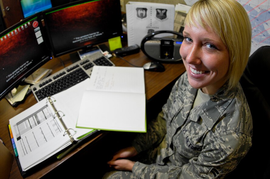 MINOT AIR FORCE BASE, N.D. -- Airman 1st Class Yvonne R. Dick, 5th Maintenance Operations Squadron maintenance scheduler, is from Frontenac, Minn., and entered the Air Force in September 2009. She plans to continue her college education and strive for a "below-the-zone" promotion. She said of her workplace and upgrade training, "I am a clean slate, a fresh start with a new set of eyes. If they want to see change -- they make change out of a new Airman." In her free time, Airman Dick enjoys "trying new things, rollerblading and weight lifting," among others. (U.S. Air Force photo by Senior Airman Benjamin Stratton)