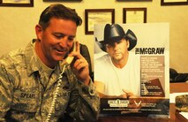 SMSgt Robert B. Spears Jr. senior recruiter for the 916th ARW promotes the upcoming Get 1 Now concert. The concert is headlining Tim McGraw, country music artist, July 24th. (USAF photo by Staff Sgt. Terrica Y. Jones 916ARW/PA)
