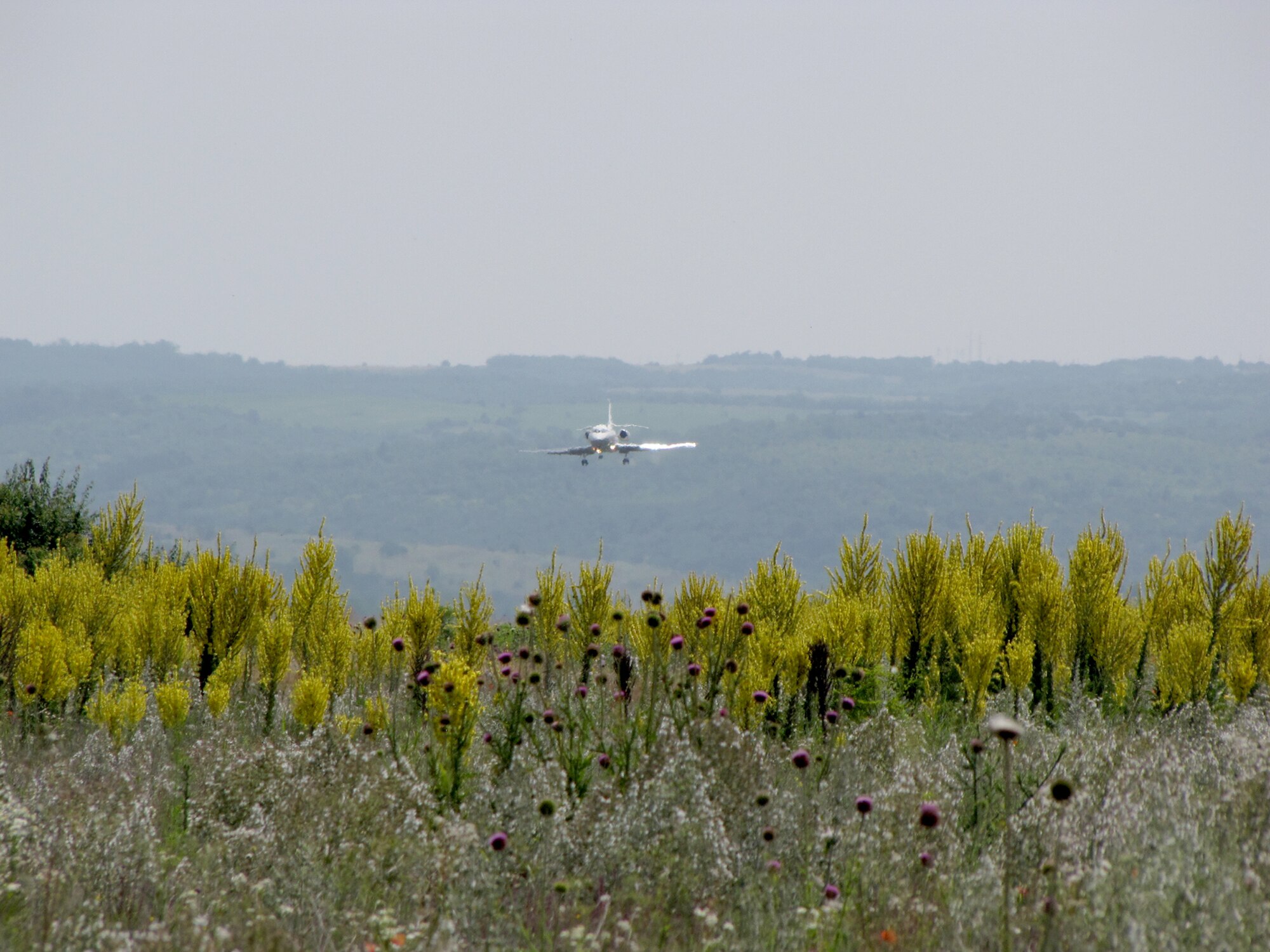 A Bulgarian aircraft approaches the runway in June at Dolna Mitropolia Air Base, Bulgaria. There, an Electronic Systems Center and contractor team completed a foreign military sales project that provided a tactical air navigation system to the Bulgarian air force. (Courtesy photo)