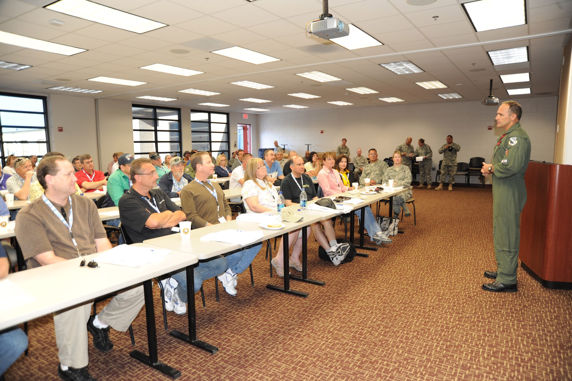 Brig Gen Trulan A. Eyre, 140th Wing Commander, speaks to employers of Colorado Air National Traditional Guardsmen.  Citizen-Airmen of the Colorado Air National Guard showcased 140th Wing capabilities to their employers at Buckley AFB, Colo. July 10. This day was part of the Employers Support of the Guard and Reserve program.
