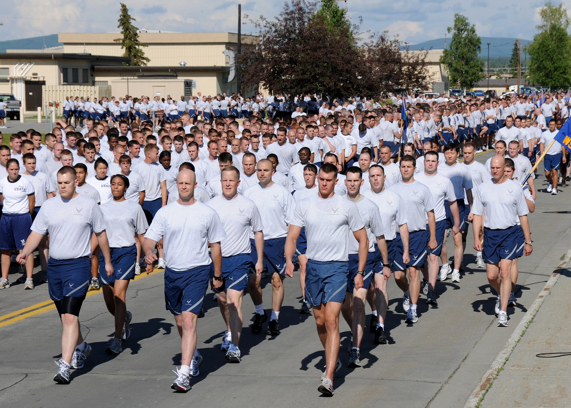 Airmen of the 354th Fighter Wing participate in a wing run on July 2, 2010 at Eielson Air Force Base, Alaska.  The run was intended to boost morale and build camraderie between the Airmen.  (U.S. Air Force photo/Staff Sgt. Tia Wilson)