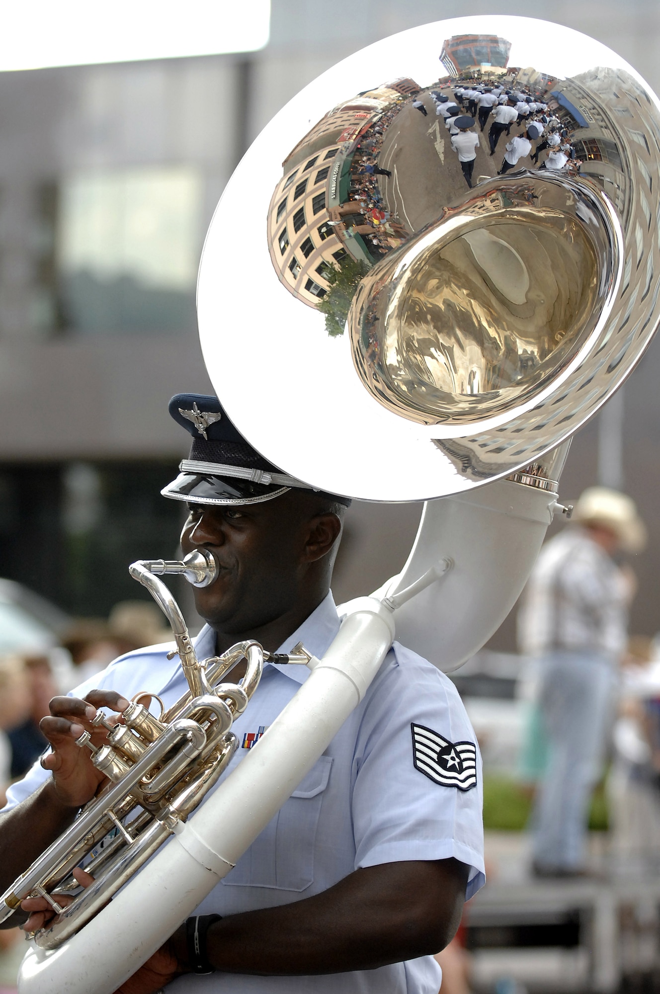 Tech. Sgt. Emanuel Jester marches as part of the Air Force Academy Band in the Pikes Peak or Bust Rodeo Parade July 13, 2010, in Colorado Springs, Colo. (U.S. Air Force photo/Mike Kaplan)