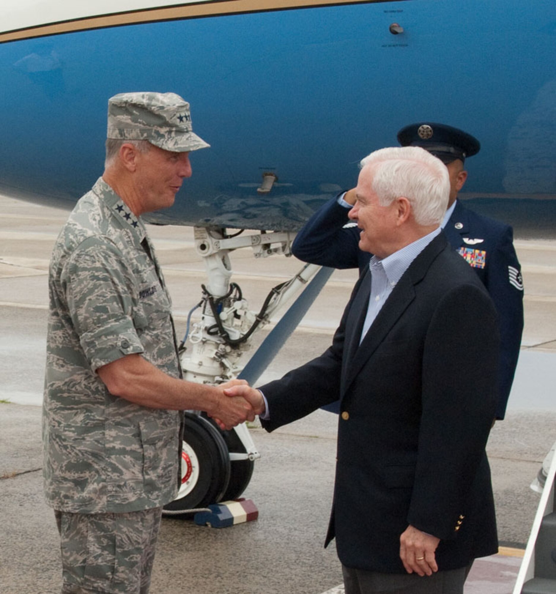 Secretary of Defense Robert M. Gates shakes hands with Electronic Systems Center Commander Lt. Gen. Ted F. Bowlds on the flight line at Hanscom AFB, Mass., July 10.  Secretary Gates landed at Hanscom enroute to an appearance at the National Governors Association Annual Meeting in Boston. (U.S. Air Force photo by Rick Berry)
