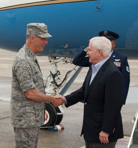 Secretary of Defense Robert M. Gates shakes hands with Electronic Systems Center Commander Lt. Gen. Ted F. Bowlds on the flight line at Hanscom AFB, Mass., July 10.  Secretary Gates landed at Hanscom enroute to an appearance at the National Governors Association Annual Meeting in Boston. (U.S. Air Force photo by Rick Berry)
