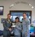 LANGLEY AIR FORCE BASE, Va. -- Col. Matt Molloy, 1st Fighter Wing commander (left), and Chief Master Sgt. Kevin Jurgella, 1 FW command chief, present a check for $250 to Master Sgt. Tashawna Wyse, Senior Noncomissioned Officer induction ceremony committe chairperson, at 1 FW headquarters July 7. The donation will help finance the ceremony, which will be held July 16 at 6 p.m. at the Bayside Enlisted
Club. (Photo courtesy/Tech. Sgt. Lisette Spencer)