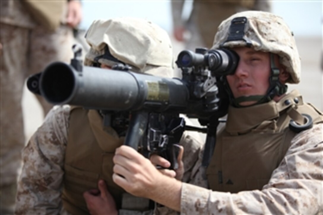 U.S. Marines with Special Purpose Marine Air-Ground Task Force 24 show Peruvian marines how to fire a shoulder-launched multipurpose assault weapon in Salinas, Peru, on July 10, 2010.  The U.S. Marines are embarked aboard the transport dock ship USS New Orleans (LPD 18) in support of Partnership of the Americas/Southern Exchange, a combined amphibious exercise with maritime forces from Argentina, Mexico, Peru, Brazil, Uruguay and Colombia.  