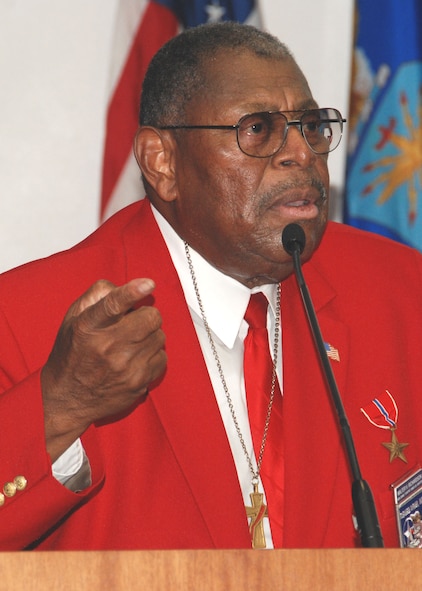 Retired Chief Master Sgt. Walter Richardson delivers remarks inside the Duke Field base theater July 10.  An original member of the famed World War II-era Tuskegee Airmen, the 30-year veteran spoke to a mass audience of 919th Special Operations Wing reservists about his role as one of the first African-American Airmen tasked to begin integrating the fledgling U.S. Air Force.   (U.S. Air Force photo/Tech. Sgt. Cheryl Foster)