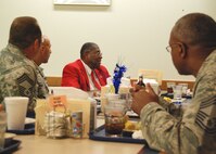 Retired Chief Master Sgt. Walter Richardson talks with members of Duke Field’s Chiefs Group during lunch at the base dining facility July 10.  An original member of the famed World War II-era Tuskegee Airmen, the 30-year veteran later spoke to a mass audience of 919th Special Operations Wing reservists about his role as one of the first African-American Airmen tasked to begin integrating the fledgling U.S. Air Force.  (U.S. Air Force photo/Tech. Sgt. Cheryl Foster)