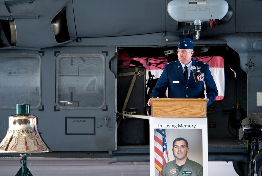 NELLIS AIR FORCE BASE, NEV.-- Lt. Col. Daniel Duffy, Director of Operations 66th Rescue Squadron, paid his final respects to Capt. David Wisniewsk during a memorial service, July 15, 2010. Captain Wisniewski, 31, an HH-60G helicopter pilot assigned to the 66th RQS, passed away at the National Naval Medical Center in Bethesda, Md., July 2 from injuries received when an HH-60G Pave Hawk helicopter crashed in southeastern Afghanistan June 9. Four other Airmen were killed and two others were wounded during the incident. (US Air Force Photo by Lawrence Crespo) 
