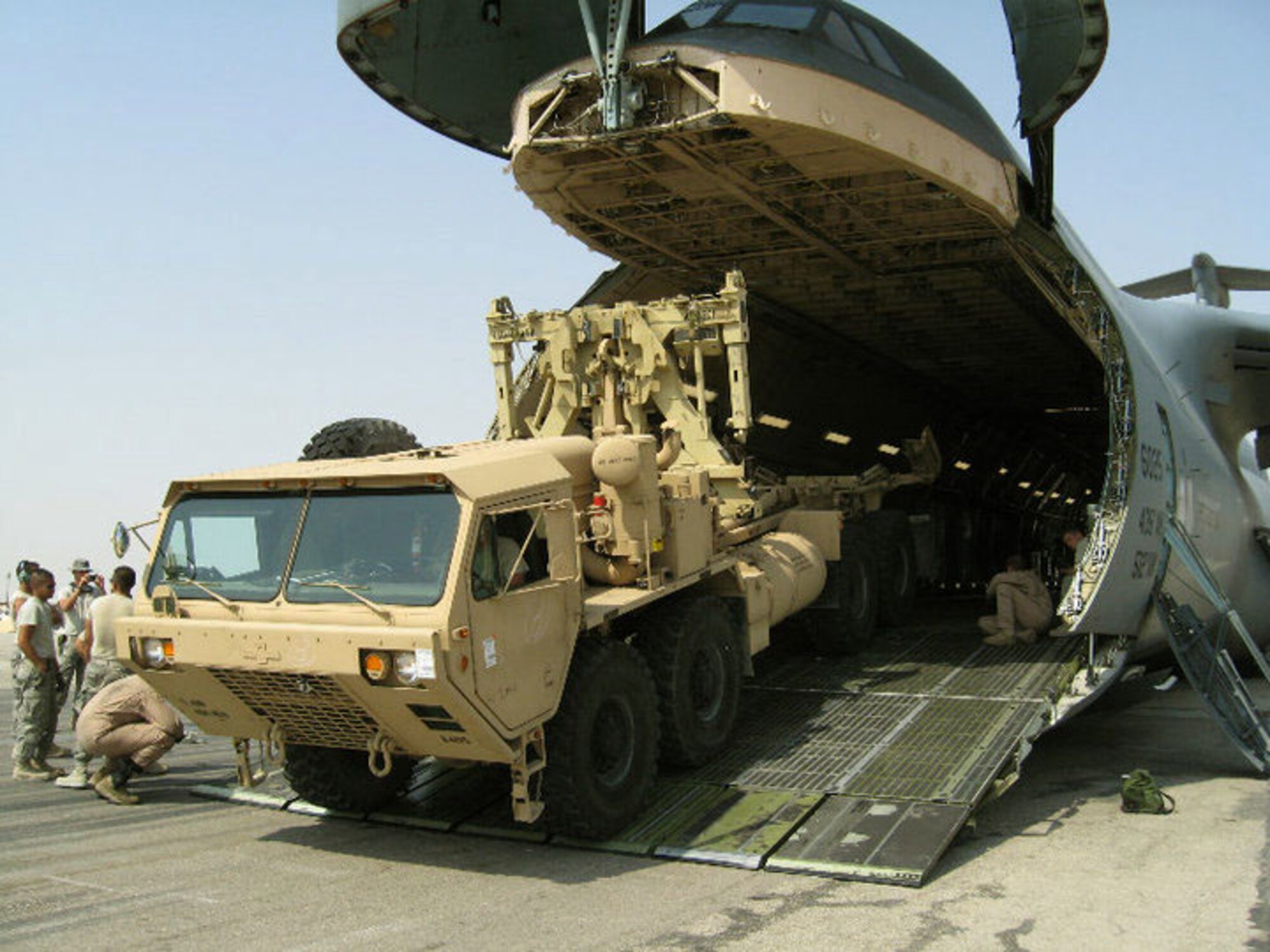 Reserve and active-duty C-5 aircrews from Dover Air Force Base, Del., spent June 15, 2010 through July 15, 2010 overseas supporting the Afghanistan troop surge by delivering 4 million pounds of cargo to various locations in Afghanistan. (Courtesy photo)