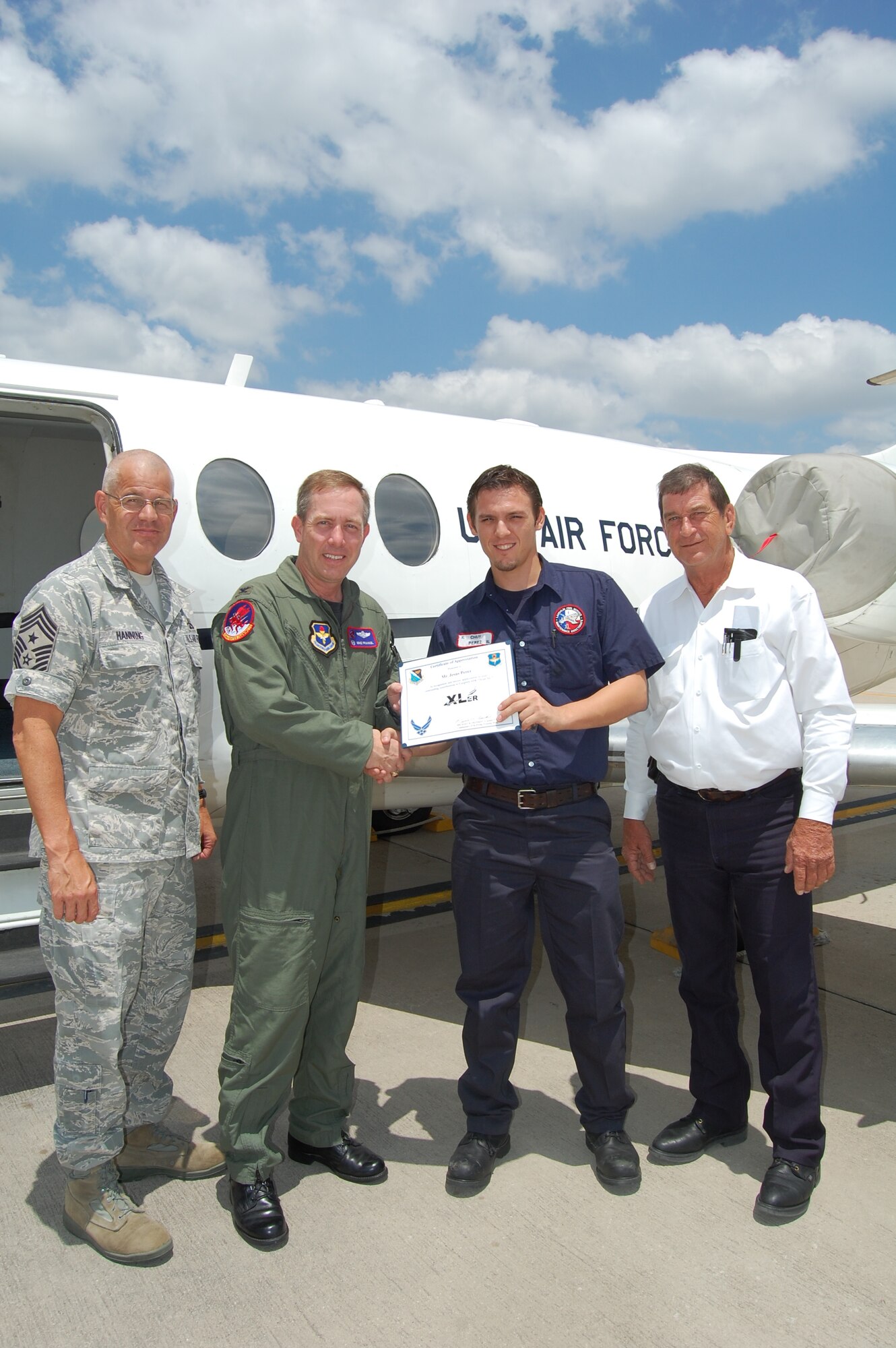 LAUGHLIN AIR FORCE BASE, Texas – Jesus Perez, 47th Maintenance Squadron, is presented the XLer of the Week award by Col. Michael Frankel, 47th Flying Training Wing commander, July 14. The XLer is a weekly award chosen by 47th FTW leadership and given to individuals who consistently make outstanding contributions to Laughlin and their unit. (U.S. Air Force photo by Staff Sgt. Desiree Economides)