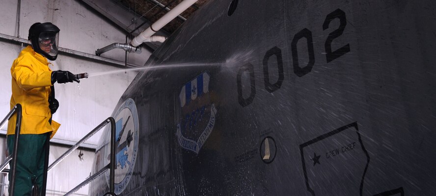 BARKSDALE AIR FORCE BASE, La. Col. Steven L. Basham, 2d Bomb Wing commander, washes a B-52H Stratofortress July 13. During the 2010 Air Force Assistance Fund campaign the 2d Maintenance Group sponsored a contest to wash a B-52, raising over $2,000 for the AFAF. Colonel Basham was able to wash his own aircraft he flew during his fini-flight. (U.S. Air Force photo by Senior Airman La?Shanette V. Garrett)(RELEASED)