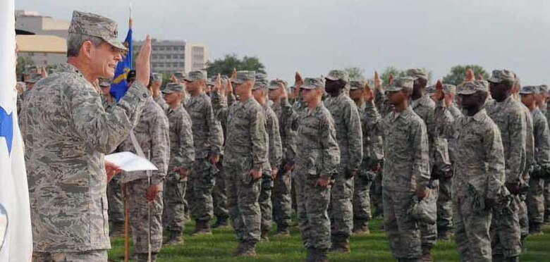 Air Force Chief of Staff Gen. Norton Schwartz officiates the oath of enlistment July 9, 2010, to graduates of Air Force Basic Military Training at Lackland Air Force Base, Texas. (U.S. Air Force photo/Alan Boedeker)