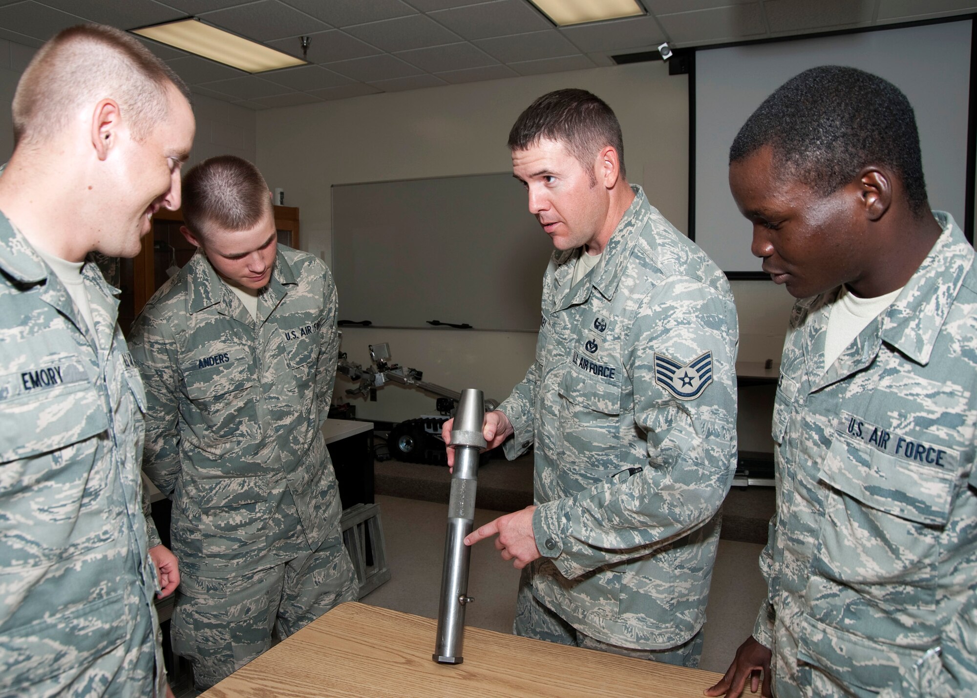 Staff Sgt. Kevin Beasley, 366th Training Squadron Det. 3, instructs Airmen on the equipment involved in explosive ordnance disposal during classroom training at Eglin Air Force Base, Fla.  (Courtesy photo.)