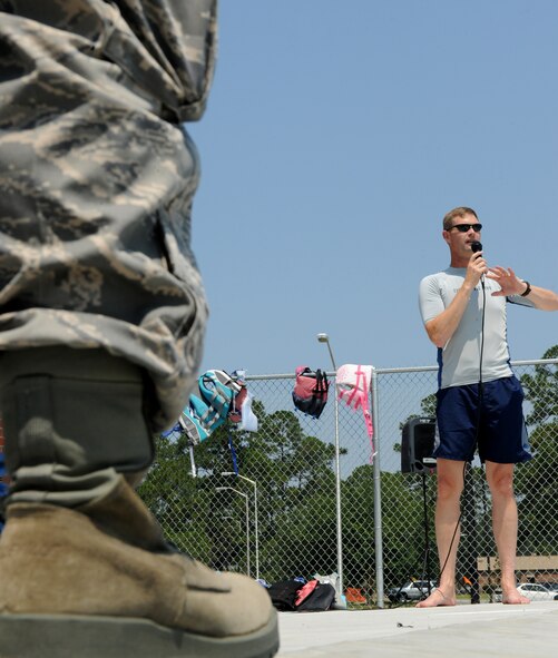 MOODY AIR FORCE BASE, Ga. -- Col. Gary Henderson, 23rd Wing commander, speaks to Moody members during the opening ceremony of the new outdoor swimming pool here July 9. The pool will remain open through Labor Day and possibly later, if weather permits. (U.S. Air Force photo by Airman 1st Class Benjamin Wiseman/RELEASED)