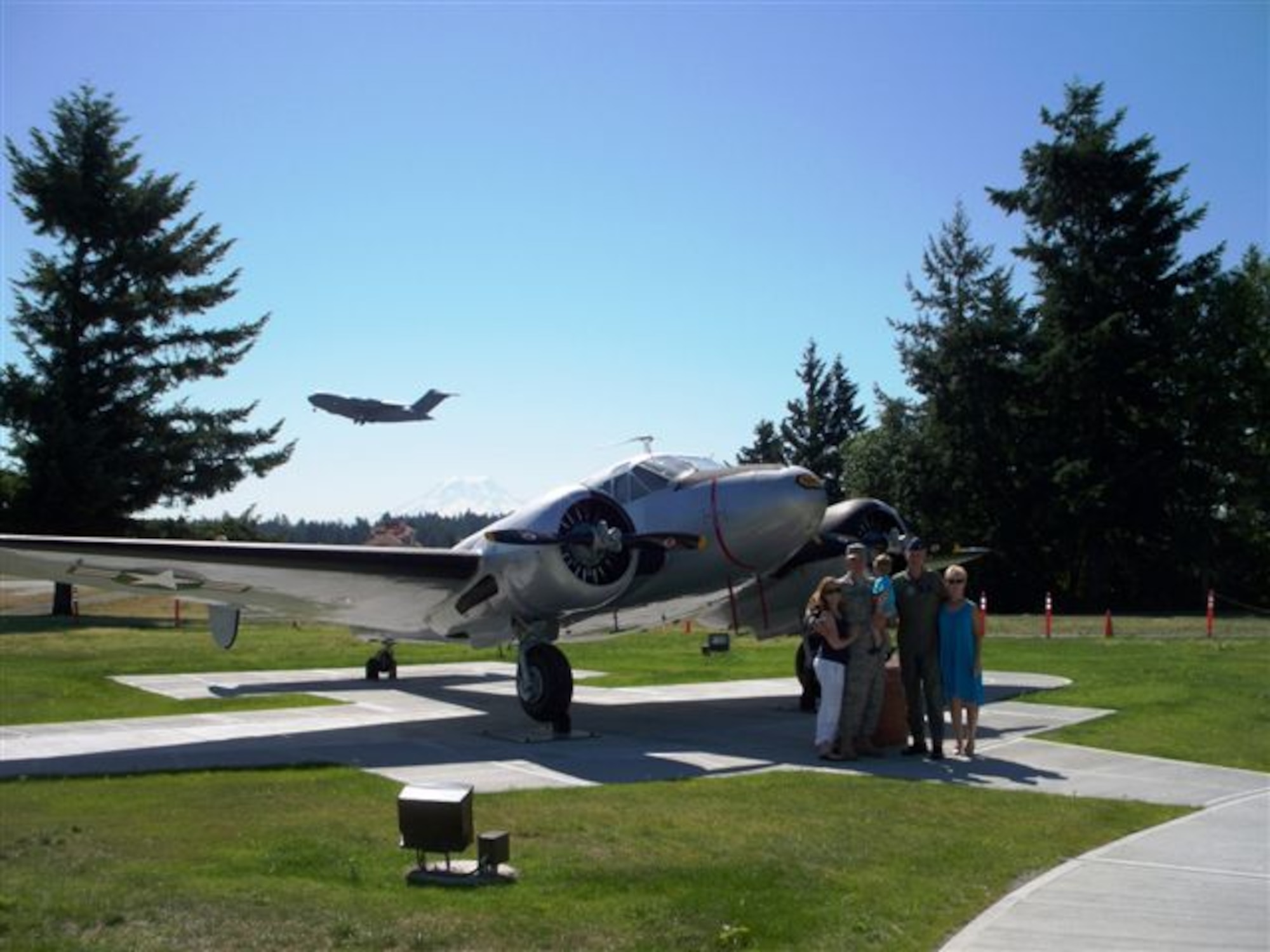 Tech Sgt. Douglas Seekins poses for a photograph with his wife,  Brandi, his son, Brody, his mother, Judi, and his father, retired Lt. Col. Scott Seekins, on Heritage Hill July 8. (U.S. Air Force photo/Amn Leah Young)