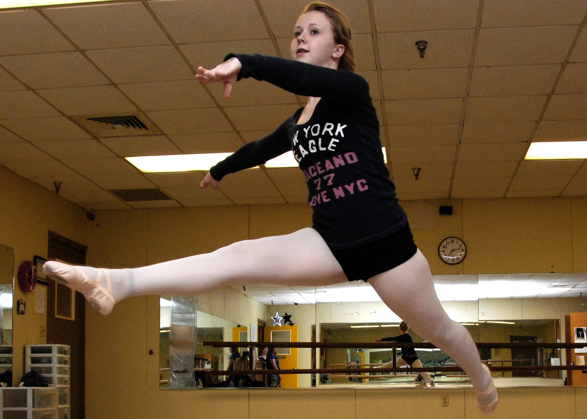 Megan Mickley, 15, practices her dance techniques at the Eglin Youth Center. Ms. Mickley was recently named a 2010 Air Force Youth of the Year for her volunteer work. In 2009, she spent more than 500 hours teaching students proper dance moves at the center. (Air Force Photo/Samuel King Jr.) 