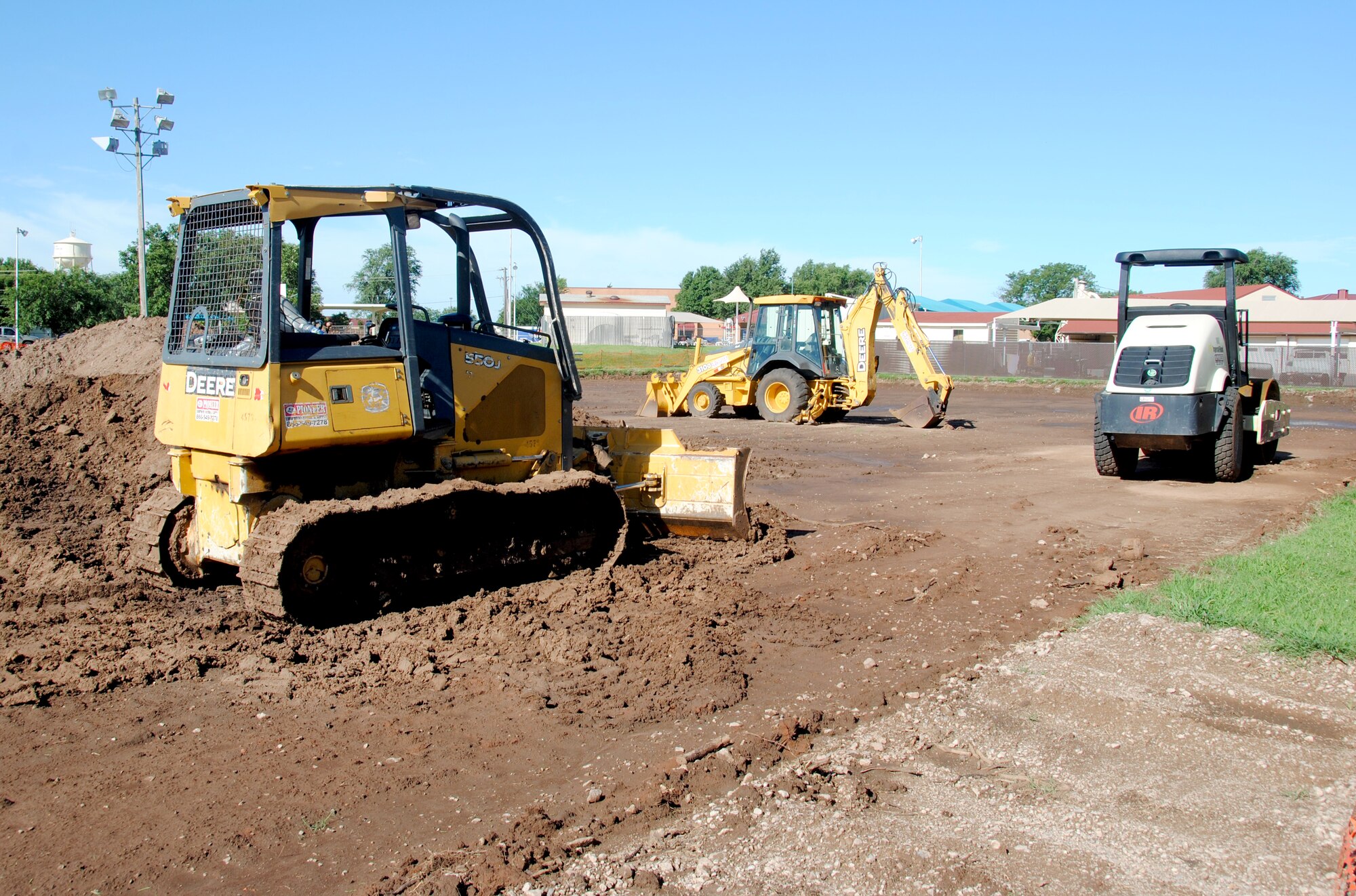 The tennis courts near the Fitness Center are undergoing a complete renovation that will include a professional playing surface, better lighting, and a rest area between the courts. Scheduled opening date is Sept. 22. (U.S. Air Force photo)
