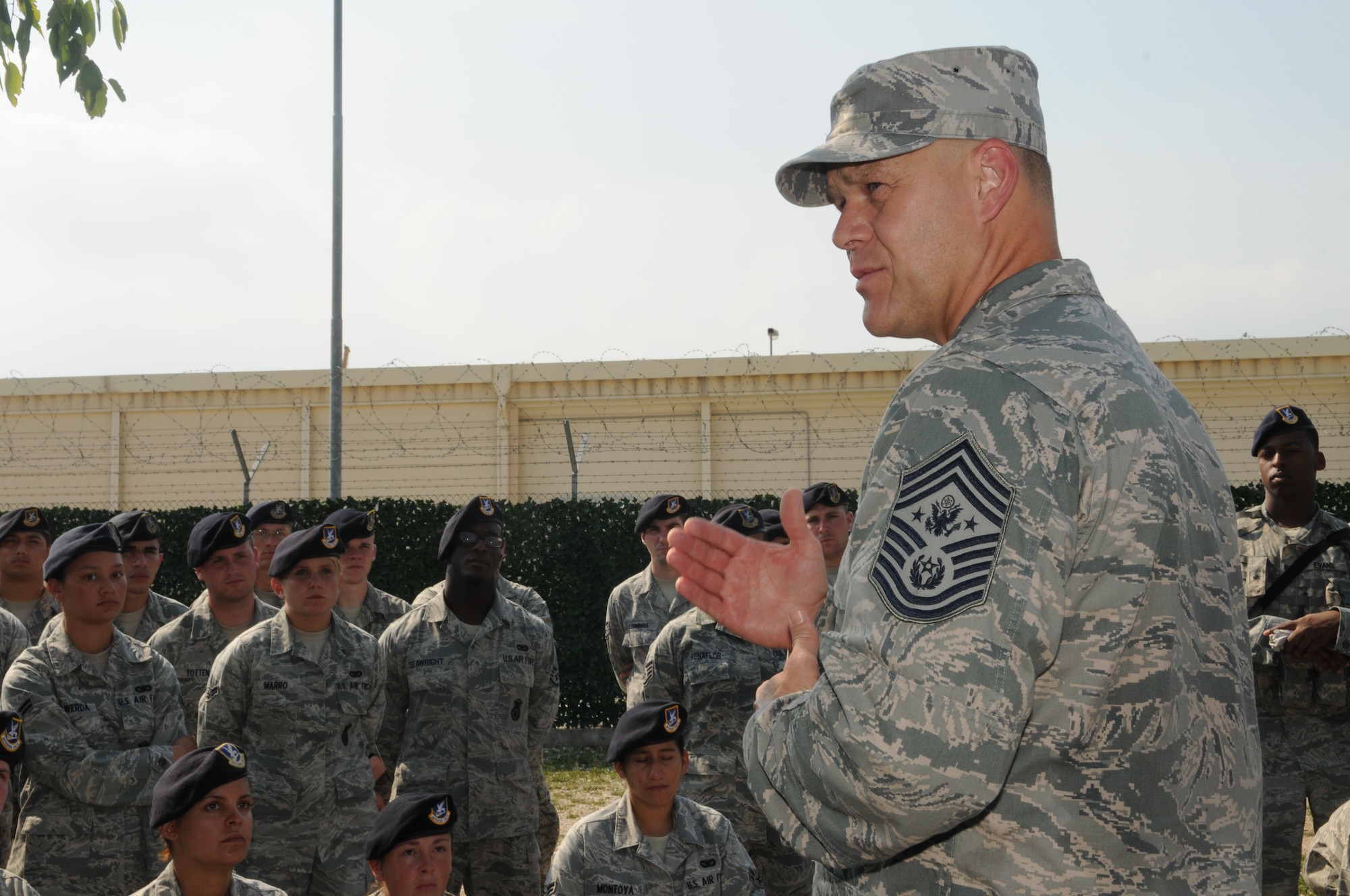 Chief Master Sgt. of the Air Force James Roy talks to 31st Security Forces Squadron Airmen July 9 as part of his U.S. Air Forces in Europe visit. While at Aviano, Chief Roy visited the Radar Approach Control, Explosive Ordnance Disposal unit, Air Mobility Command Terminal, 31st Medical Group clinic, 31st Civil Engineer Squadron compound and 31st Security Forces Squadron Armory. (U.S. Air Force photo/Staff Sgt. Nadine Barclay)