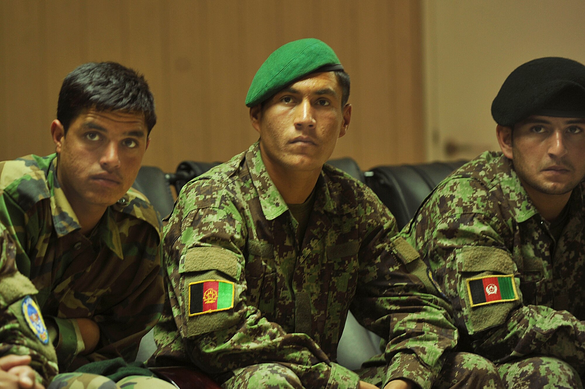 Afghan Air Force members listen to U.S. Air Force personnel of the 738th Air Expeditionary Advisory Group conduct a mishap safety briefing for a command post exercise at Kandahar Airfield July 7, 2010.  The briefing was a table top meeting with members of the Afghan Air Force and advisors from the 738 AEAG prior to a downed aircraft exercise that will be held at Kandahar Airfield, Afghanistan.  (U.S. Air Force photo/Staff Sgt. Quinton Russ/released)