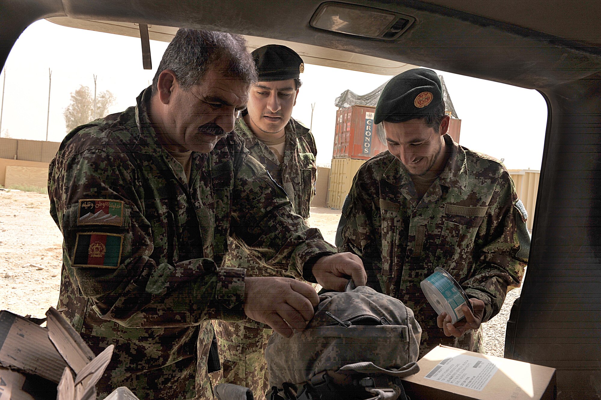 Afghan Air Force security forces members search for explosive devices during a vehicle search training exercise at Kandahar Airfield June 30, 2010.  The training prepares the Afghan security forces for realistic events they may encounter while in the field.   (U.S. Air Force photo/Staff Sgt. Quinton Russ/released)