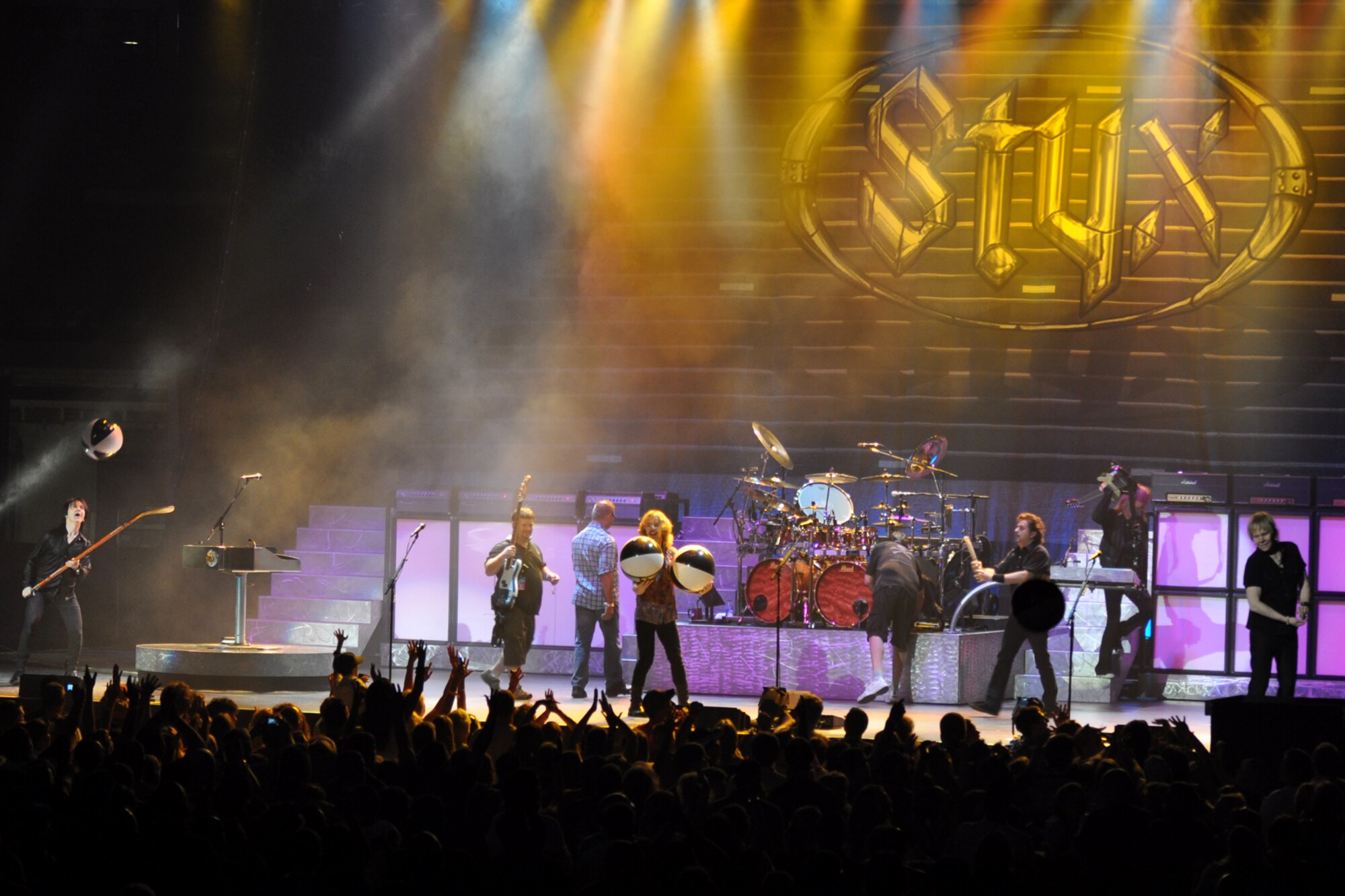 Members of the legendary rock band, Styx, throw beach balls to the crowd after their encore for the appreciative crowd at a concert at the CenturyTel Arena, Bossier City, La., July 4, 2010. To celebrate Independence Day and honor the men and women serving our nation at home and overseas, the Air Force Reserve Command sponsored a free concert for any member of the Armed Forces and their immediate families. Best known for their chart topping power ballads such as "Renegade," "Blue Collar Man," and "Too Much Time on My Hands," Styx has performed to sold out audiences around the world. Former U.S. Air Force Sergeant Billy Bretherton, star of the hit television show “Billy the Exterminator,” emceed the event. (U.S. Air Force photo/Tech. Sgt. Jeff Walston)