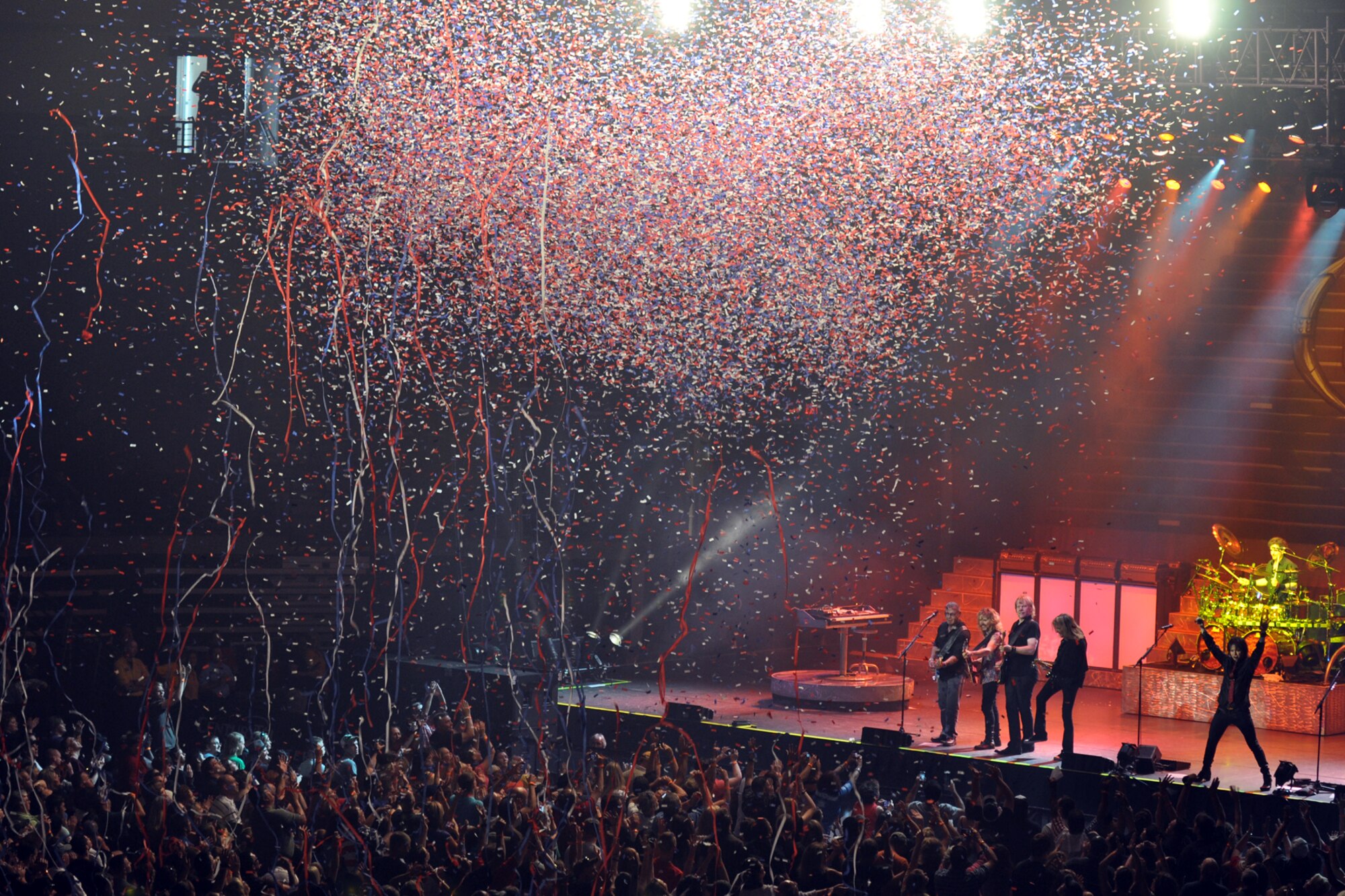 Members of the legendary rock band, Styx, close the show with a shower of confetti after a concert at the CenturyTel Arena, Bossier City, La., July 4, 2010. To celebrate Independence Day and honor the men and women serving our nation at home and overseas, the Air Force Reserve Command sponsored a free concert for any member of the Armed Forces and their immediate families. Best known for their chart topping power ballads such as "Renegade," "Blue Collar Man," and "Too Much Time on My Hands," Styx has performed to sold out audiences around the world. Former U.S. Air Force Sergeant Billy Bretherton, star of the hit television show “Billy the Exterminator,” emceed the event. (U.S. Air Force photo/Tech. Sgt. Jeff Walston)