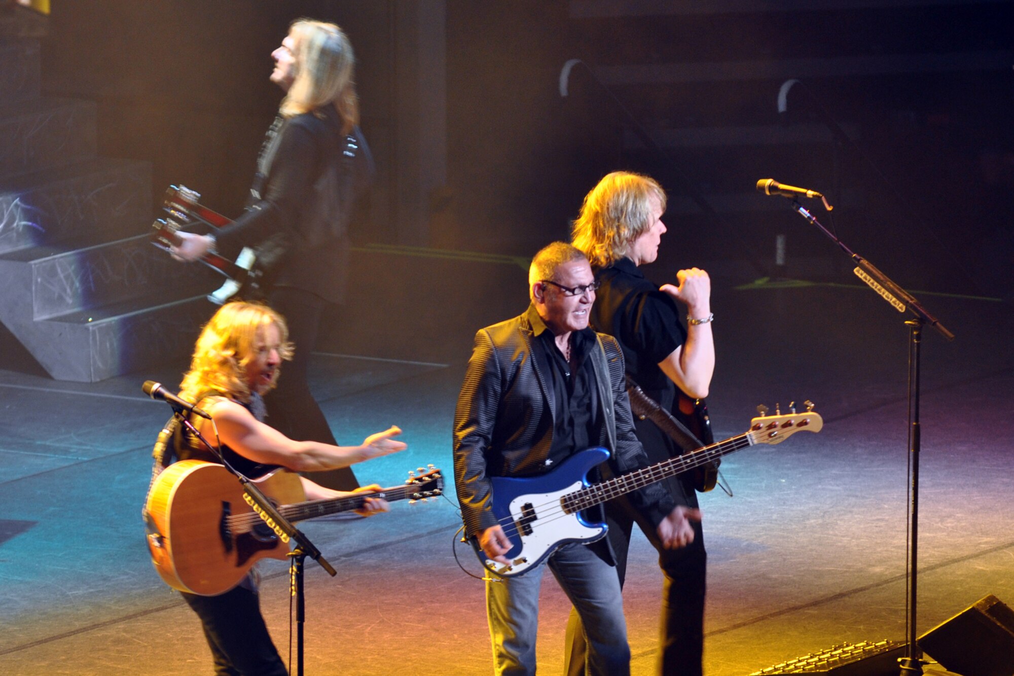 Chuck Panozzo, co-founder of the legendary rock band, Styx, takes center stage during a concert at the CenturyTel Arena, Bossier City, La., July 4, 2010. To celebrate Independence Day and honor the men and women serving our nation at home and overseas, the Air Force Reserve Command sponsored a free concert for any member of the Armed Forces and their immediate families. Best known for their chart topping power ballads such as "Renegade," "Blue Collar Man," and "Too Much Time on My Hands," Styx has performed to sold out audiences around the world. Former U.S. Air Force Sergeant Billy Bretherton, star of the hit television show “Billy the Exterminator,” emceed the event. (U.S. Air Force photo/Tech. Sgt. Jeff Walston)

