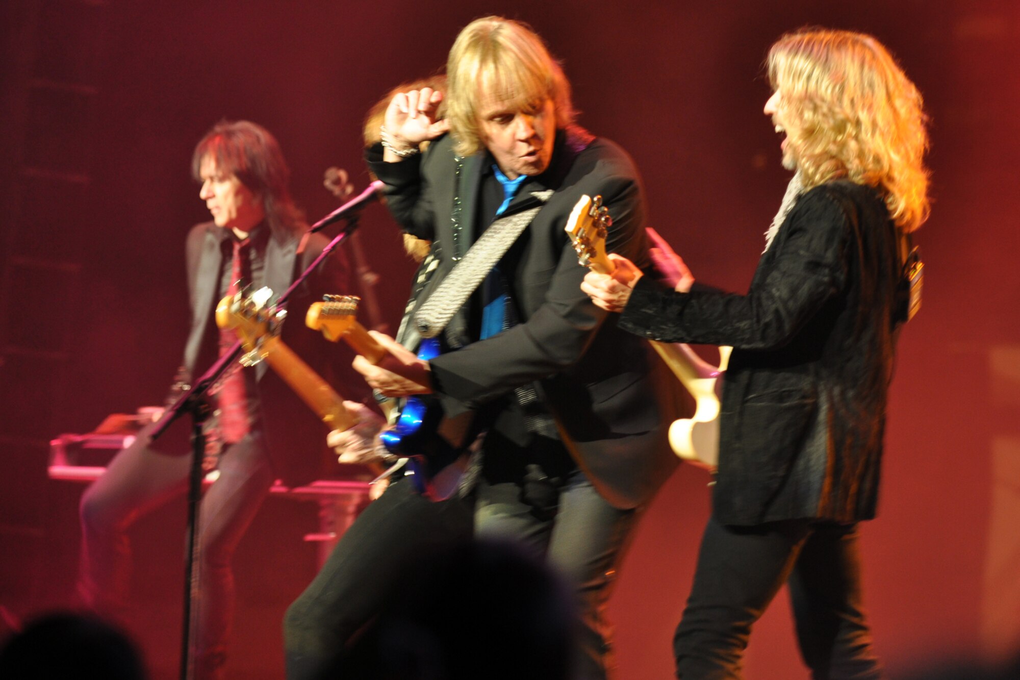 Members of the legendary rock band, Styx, entertain the crowd during a concert at the CenturyTel Arena, Bossier City, La., July 4, 2010. To celebrate Independence Day and honor the men and women serving our nation at home and overseas, the Air Force Reserve Command sponsored a free concert for any member of the Armed Forces and their immediate families. Best known for their chart topping power ballads such as "Renegade," "Blue Collar Man," and "Too Much Time on My Hands," Styx has performed to sold out audiences around the world. Former U.S. Air Force Sergeant Billy Bretherton, star of the hit television show “Billy the Exterminator,” emceed the event. (U.S. Air Force photo/Tech. Sgt. Jeff Walston)


