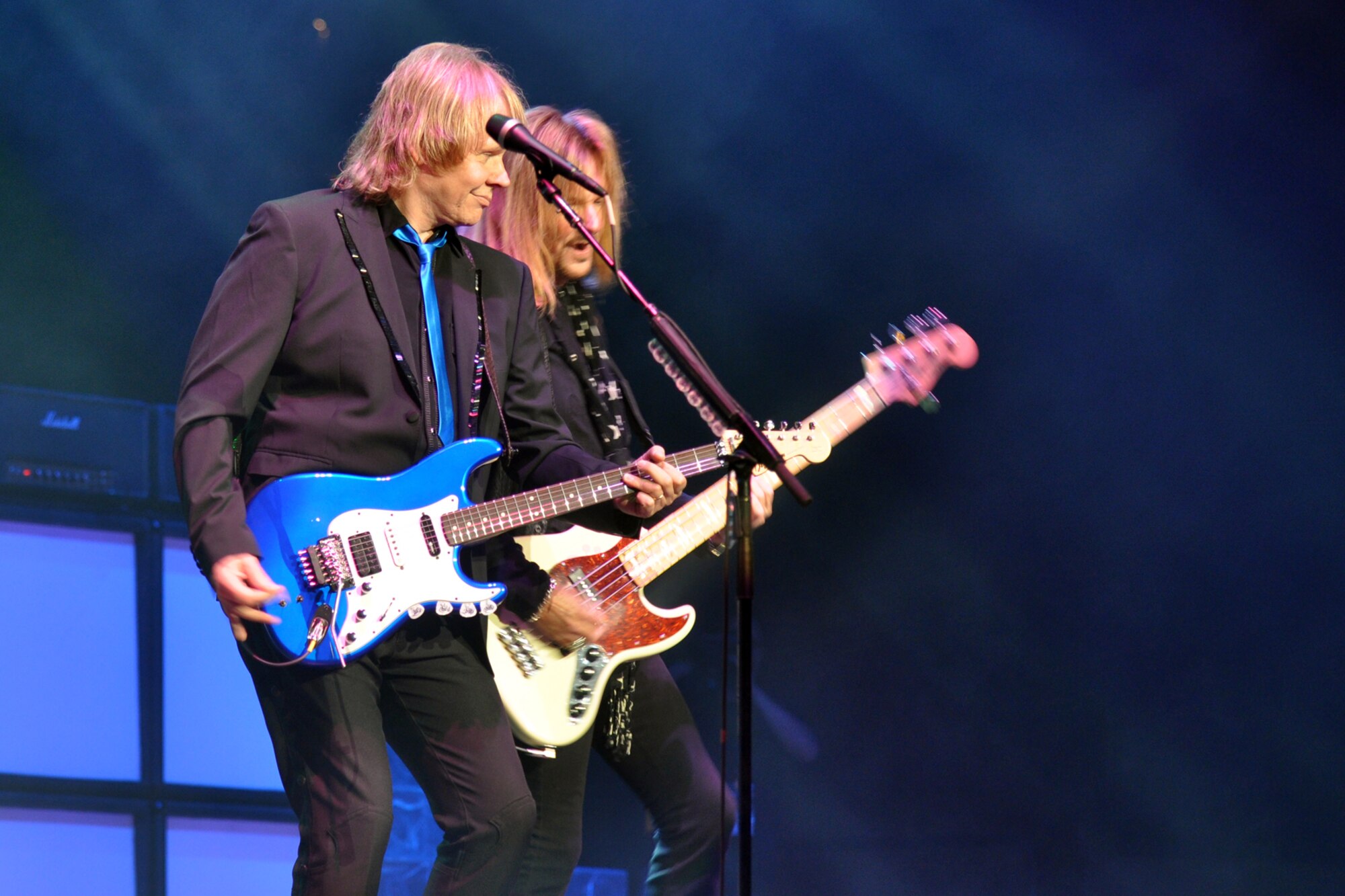 James Young and Ricky Phillips with the legendary rock band, Styx, entertain the crowd during a concert at the CenturyTel Arena, Bossier City, La., July 4, 2010. To celebrate Independence Day and honor the men and women serving our nation at home and overseas, the Air Force Reserve Command sponsored a free concert for any member of the Armed Forces and their immediate families. Best known for their chart topping power ballads such as "Renegade," "Blue Collar Man," and "Too Much Time on My Hands," Styx has performed to sold out audiences around the world. Former U.S. Air Force Sergeant Billy Bretherton, star of the hit television show “Billy the Exterminator,” emceed the event. (U.S. Air Force photo/Tech. Sgt. Jeff Walston)

