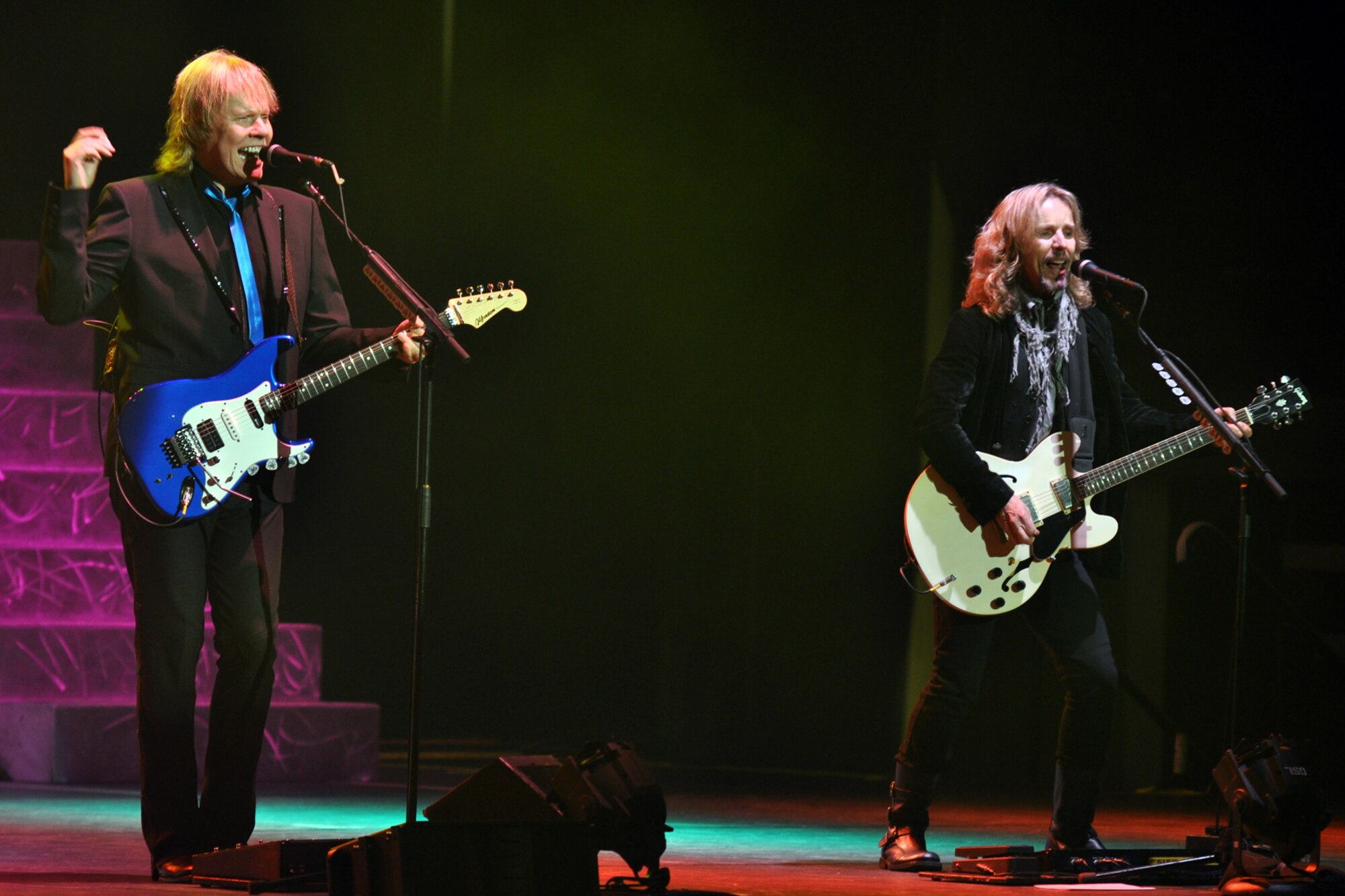 James Young and Tommy Shaw, of the legendary rock band, Styx, entertain the crowd during a concert at the CenturyTel Arena, Bossier City, La., July 4, 2010. To celebrate Independence Day and honor the men and women serving our nation at home and overseas, the Air Force Reserve Command sponsored a free concert for any member of the Armed Forces and their immediate families. Best known for their chart topping power ballads such as "Renegade," "Blue Collar Man," and "Too Much Time on My Hands," Styx has performed to sold out audiences around the world. Former U.S. Air Force Sergeant Billy Bretherton, star of the hit television show “Billy the Exterminator,” emceed the event. (U.S. Air Force photo/Tech. Sgt. Jeff Walston)