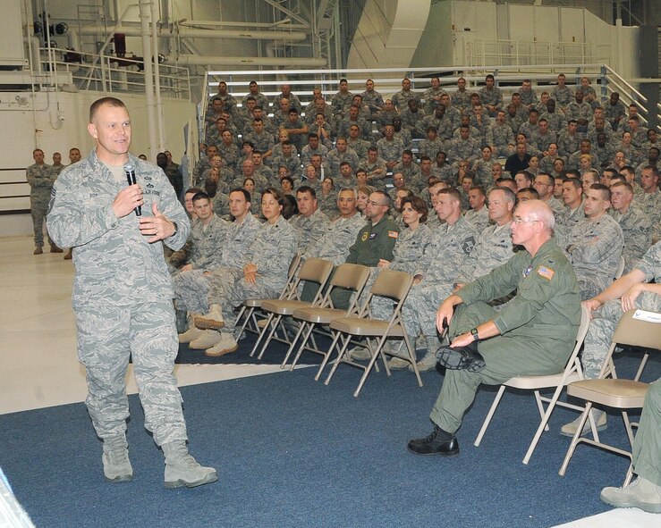 Chief Master Sgt. of the Air Force James A. Roy addresses Airmen from the 319th Air Refueling Wing during an All-Call as part of his base visit July 14 to 16. Chief Roy met with Airmen from the 319th Air Refueling Wing and toured base facilities, which allowed him to witness first-hand how Grand Forks Air Force Base is preparing for the transition to a new mission.(U.S. Air Force photo by Tech. Sgt. Johnny Saldivar)