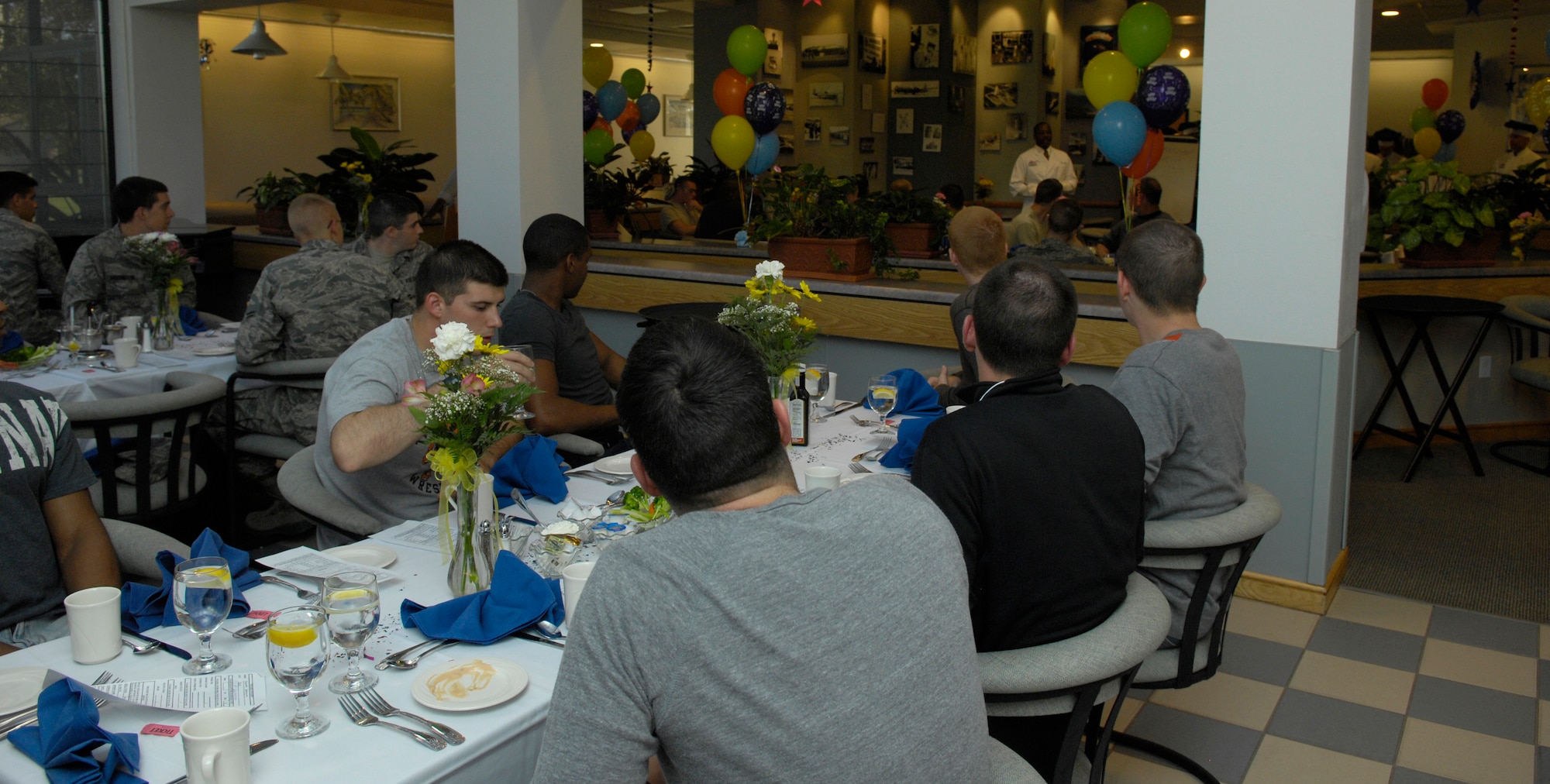 VANDENBERG AIR FORCE BASE, Calif. -- Members of Team V gathered to celebrate their birthdays during a quarterly birthday celebration at Breakers Dining Facility here Wednesday, July 14, 2010. Col. Richard Boltz, the 30th Space Wing commander, served food and drink to approximately 35 people in celebration of their birthdays. (U.S. Air Force photo/Airman 1st Class Lael Huss)