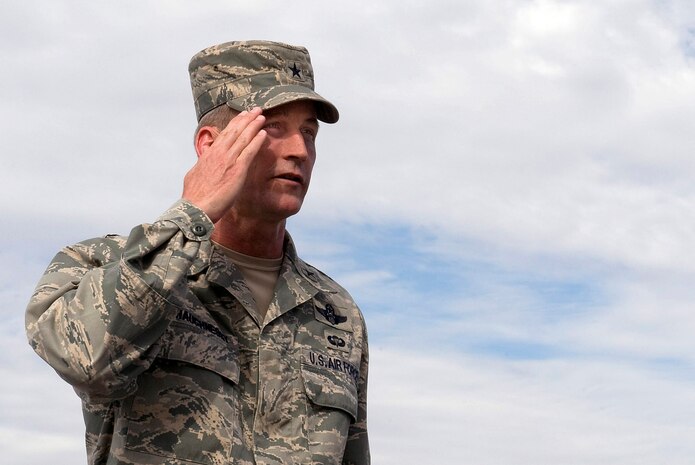 NELLIS AIR FORCE BASE, Nev.-- Brig. Gen. Terrence O'Shaughnessy, the new 57th Wing commander, renders his first salute as commander at the 57th Wing change of command ceremony July 16. The 57th Wing is responsible for 38 squadrons at 12 installations, constituting the Air Force's most diverse flying wing, flying and maintaining more than 130 aircraft. The 57th Wing also oversees the U.S. Air Force Weapons School; U.S. Air Force Air Demonstration Squadron, the Thunderbirds; and the Red Flag and Green Flag exercises. (U.S. Air Force Photo by Airman 1st Class Brett Clashman)
