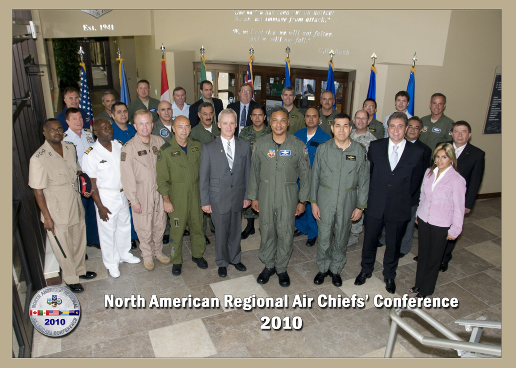 Participants of the North American Regional Air Chiefs Conference pose for a group photo in the Killey Center for Homeland Operations at Tyndall AFB, Fla., July 12-15, 2010.  The air domain experts attended the 3-day conference to ‘forge partnerships’ that impact air domain issues in North America.  (U.S. Air Force photo by Lisa Norman)