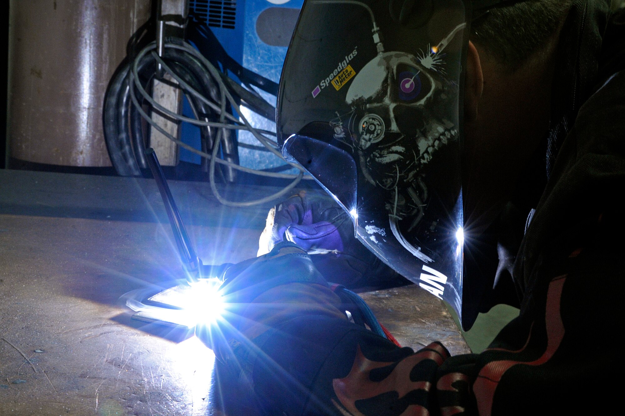 ELLSWORTH AIR FORCE BASE, S.D. – Airman 1st Class Travis Webb, 28th Maintenance Squadron metals technology apprentice, performs tungsten inert-gas welding on a piece of stainless steel, July 16. TIG welding is a precise form of welding that can be performed on a variety of metals. (U.S. Air Force photo/Airman 1st Class Matthew Flynn)