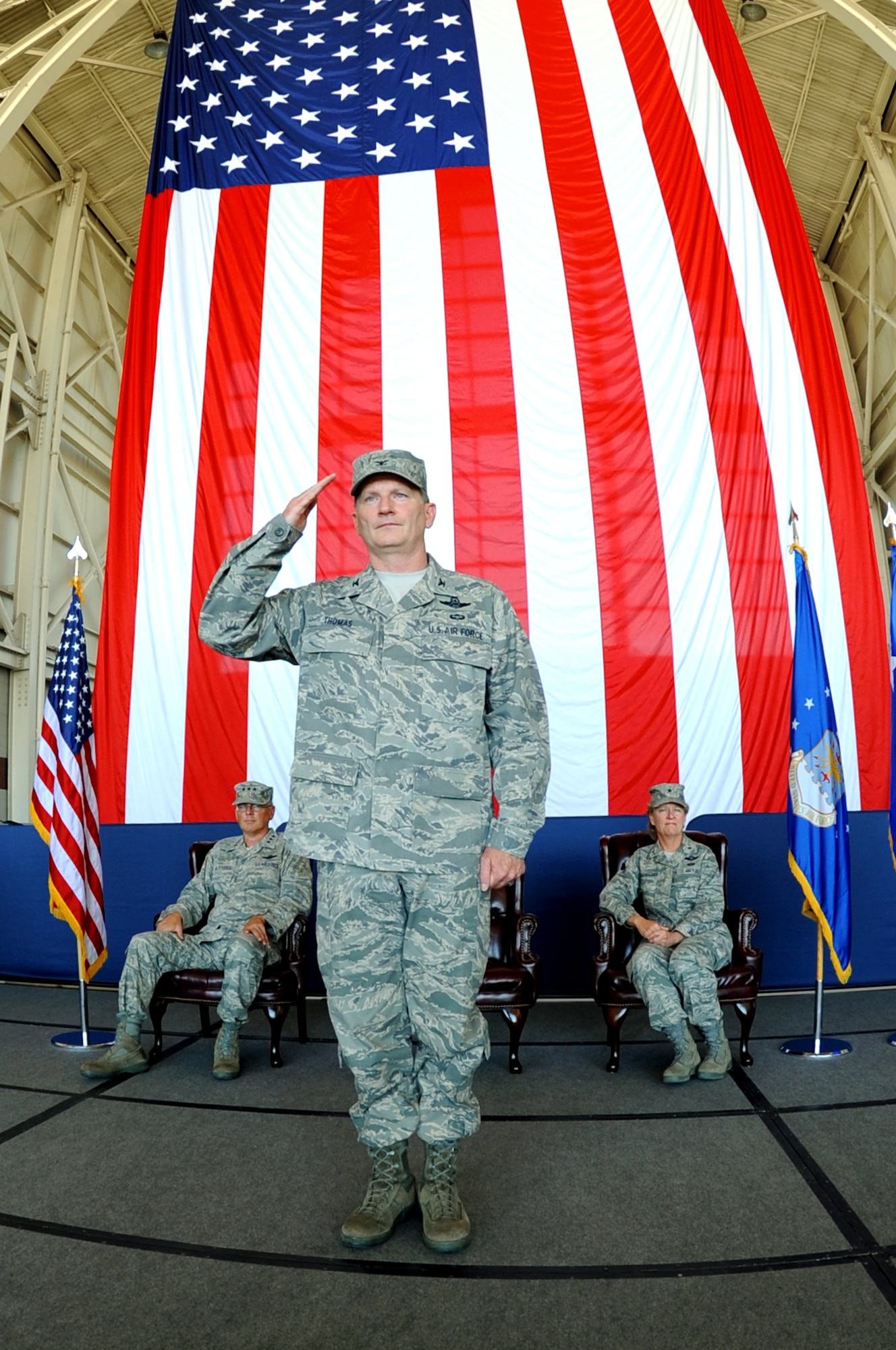 The new 15th Expeditionary Mobility Task Force commander, Col. Robert D. Thomas gives his first salute to 15th EMTF members during the 15th EMTF change of command ceremony on July 15th.  (U.S. Air Force photo by Civ/Nan Wylie)


