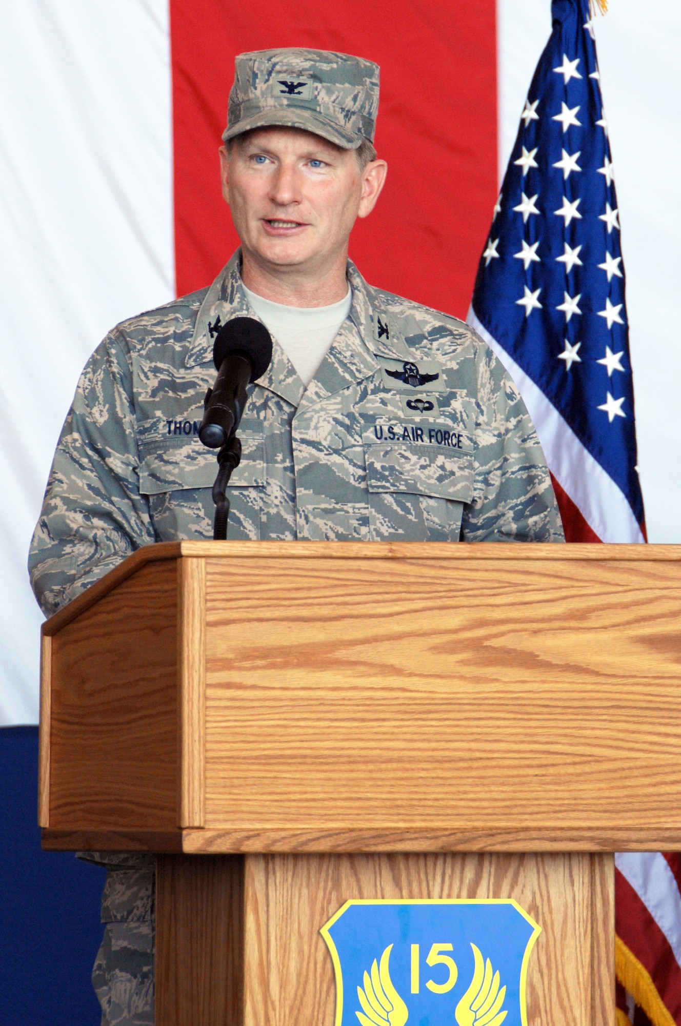 The new 15th Expeditionary Mobility Task Force commander, Col. Robert D. Thomas speaks after taking command of the 15th EMTF on July 15th.  (U.S. Air Force photo by Civ/Nan Wylie)
