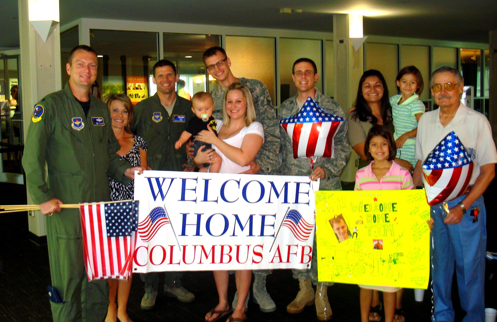 Friends, family and coworkers take a photo with newly returned deployer
Staff Sgt. Tim Martinez, 14th OSS Weather Flight. (Courtesy photo).
