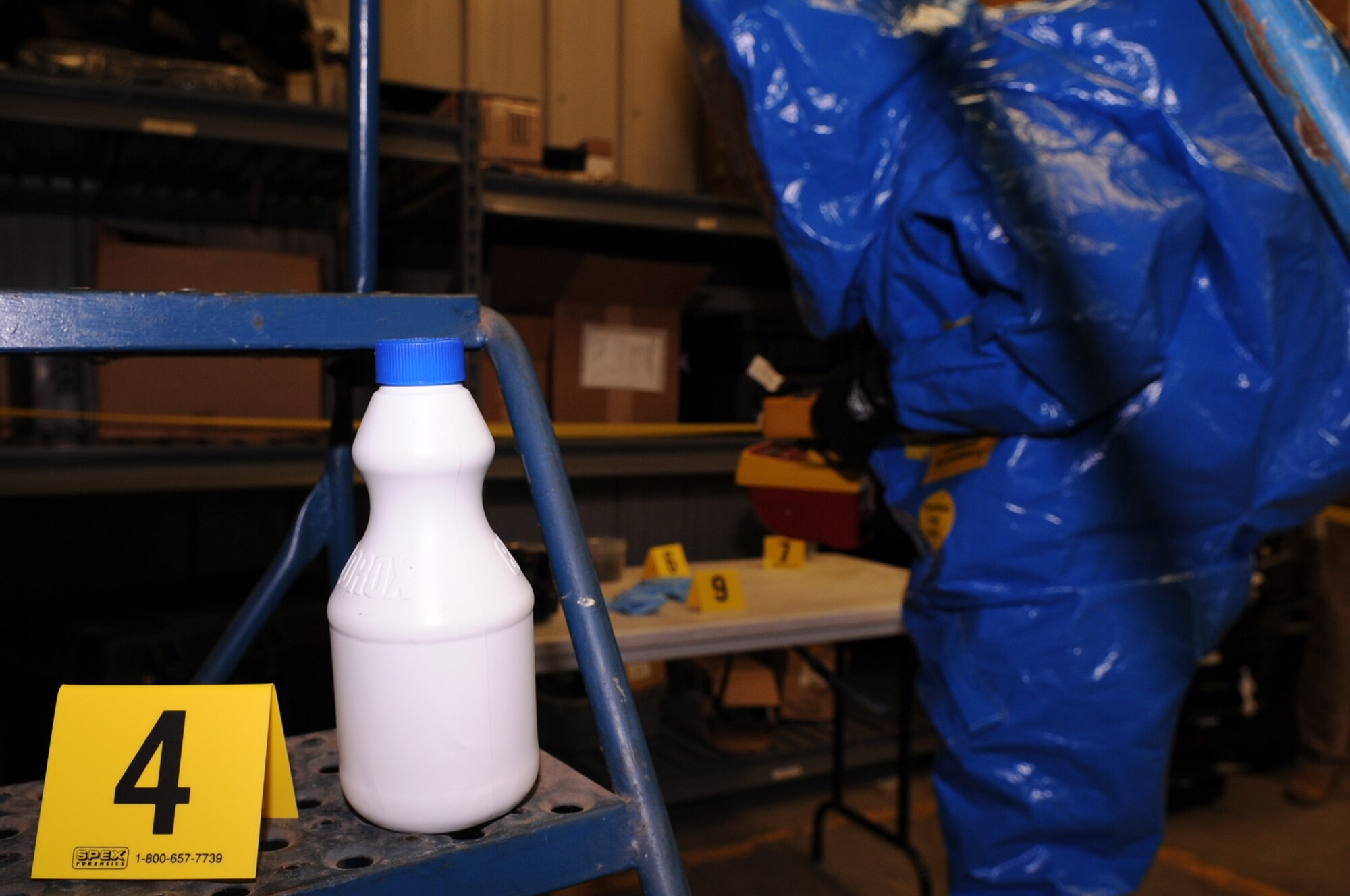 BARKSDALE AIR FORCE BASE, La-- Staff Sgt. Gene Moll, 2d Aerospace Medical Squadron occupational health noncommissioned officer in charge, goes through standard procedures as his team moves through a simulated university laboratory that has been exposured to hazardous agents. The chemical, biological, radiological, nuclear and high-yield explosives, or CBRNE, challenge trained bioenvironmental and emergency managements teams on overall response to hazardous incidents. (U.S. Air Force photo/Airman 1st Class Allison M. Boehm) (RELEASED)