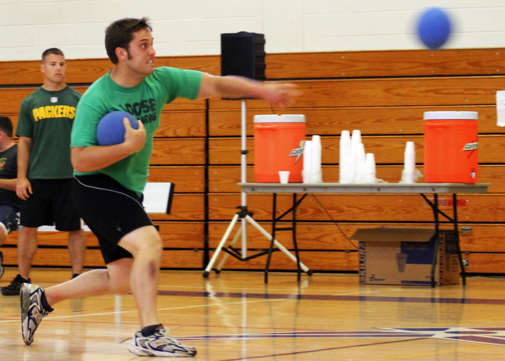 Andrew Olimb launches a ball at his opponent during a dodgeball tournament held at the fitness center July 9.  Air Force Research Lab team members took first place in the tournament.  The winning team was Joe Czabaranek, Ryan Snider, Brian Nagle, Jordan Harrison and Tim Ager.  U.S. Air Force photo/1st Lt. Albert Tao.
