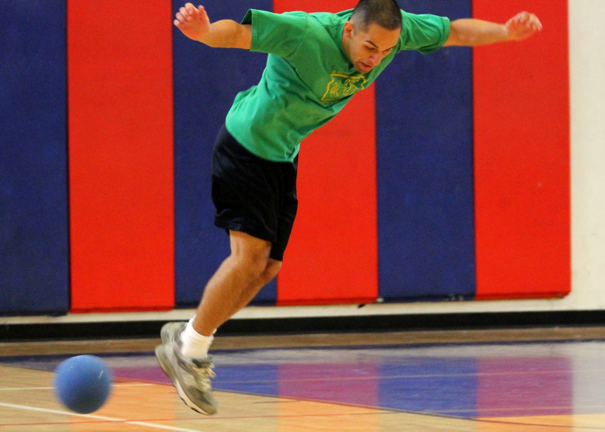 John Beilstein reacts to a ball throw at his feet during a dodgeball tournament held at the fitness center July 9.  Air Force Research Lab team members took first place in the tournament.  The winning team was Joe Czabaranek, Ryan Snider, Brian Nagle, Jordan Harrison and Tim Ager.  U.S. Air Force photo/1st. Lt. Albert Tao.
