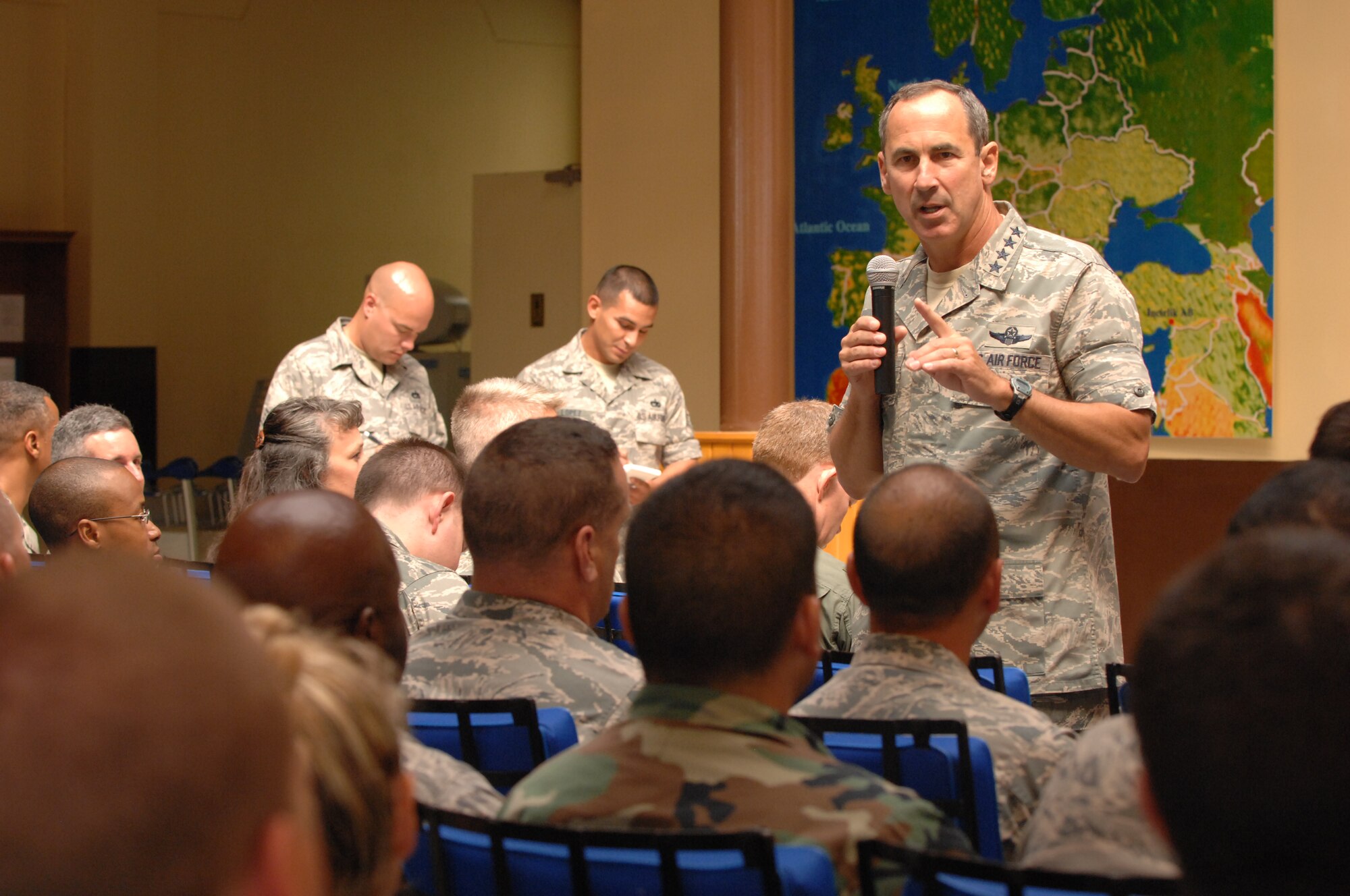 Gen. Raymond E. Johns Jr., Air Mobility Command commander, holds an all call with the 728th Air Mobility Squadron, July 13, 2010 at Incirlik Air Base, Turkey.  General Johns visited the AMC Airmen at various locations including Incirlik.   This was his first visit to Incirlik since taking command.   (U.S. Air Force Photo/Tech Sgt. Valda Wilson)
