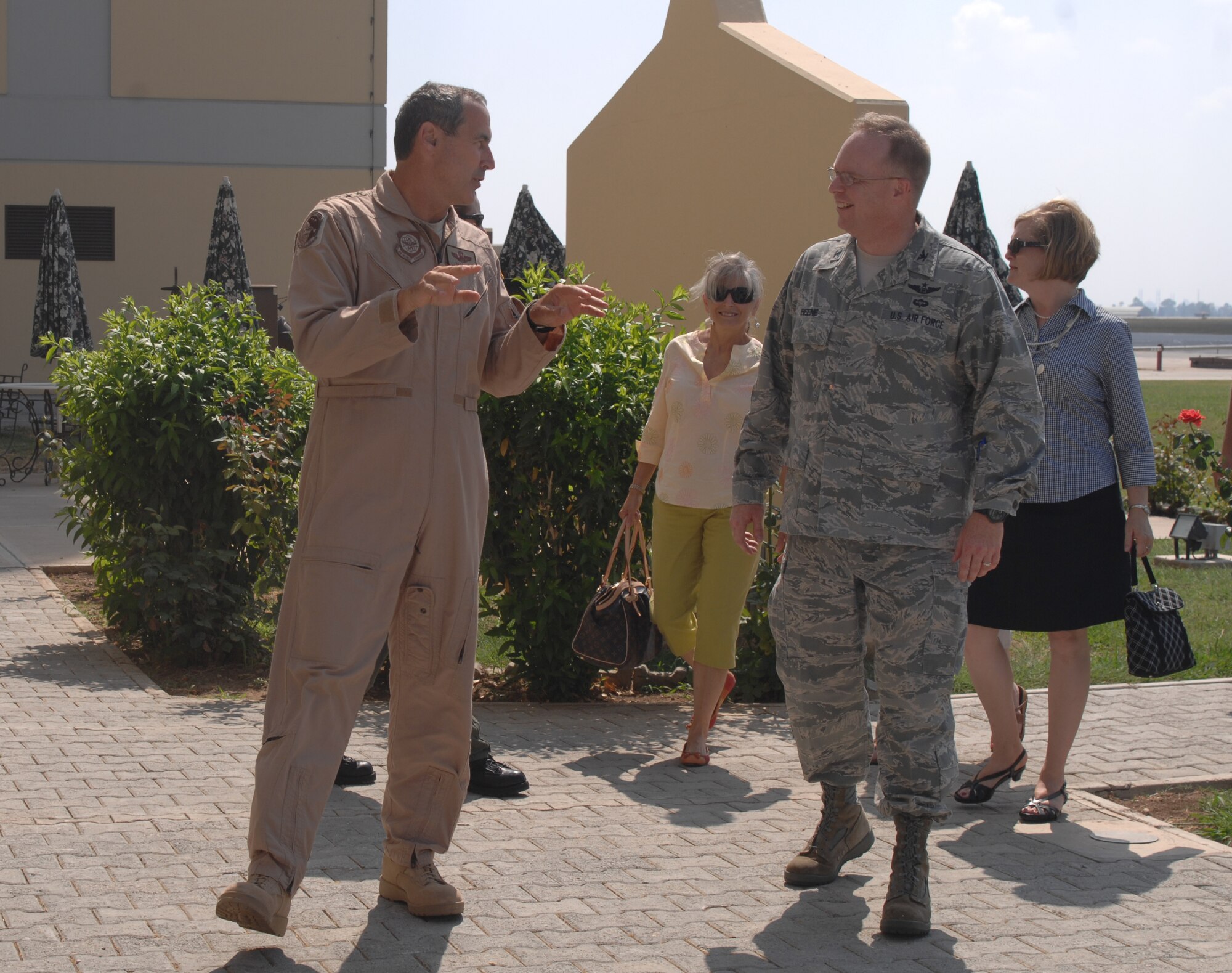 Gen. Raymond E. Johns Jr., Air Mobility Command commander speaks with Col. Eric Beene, 39th Air Base Wing commander, July 10, 2010 at Incirlik Air Base, Turkey.  General Johns visited the AMC Airmen at various locations including Incirlik.   This was his first visit to Incirlik since taking command. (U.S. Air Force Photo/Tech Sgt. Valda Wilson)
