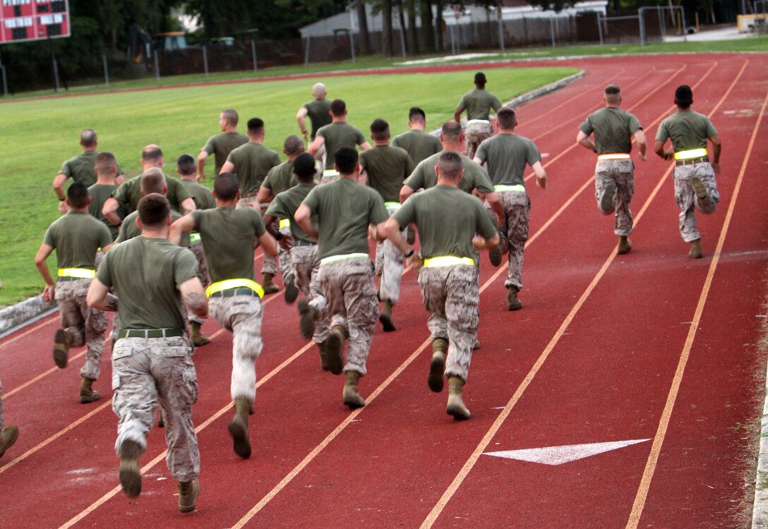 Marines with the 22nd Marine Expeditionary Unit, participate in the movement to contact, an 880-yard sprint, portion of the Combat Fitness Test aboard Camp Lejeune, N.C., July 16, 2010. The CFT incorporates two other physical elements, the ammo lift and maneuver under fire, designed to simulate situations Marines may face in combat.  This marks the second year the MEU participated in the CFT after Headquarters Marine Corps implemented it as an annual training requirement for every Marine.