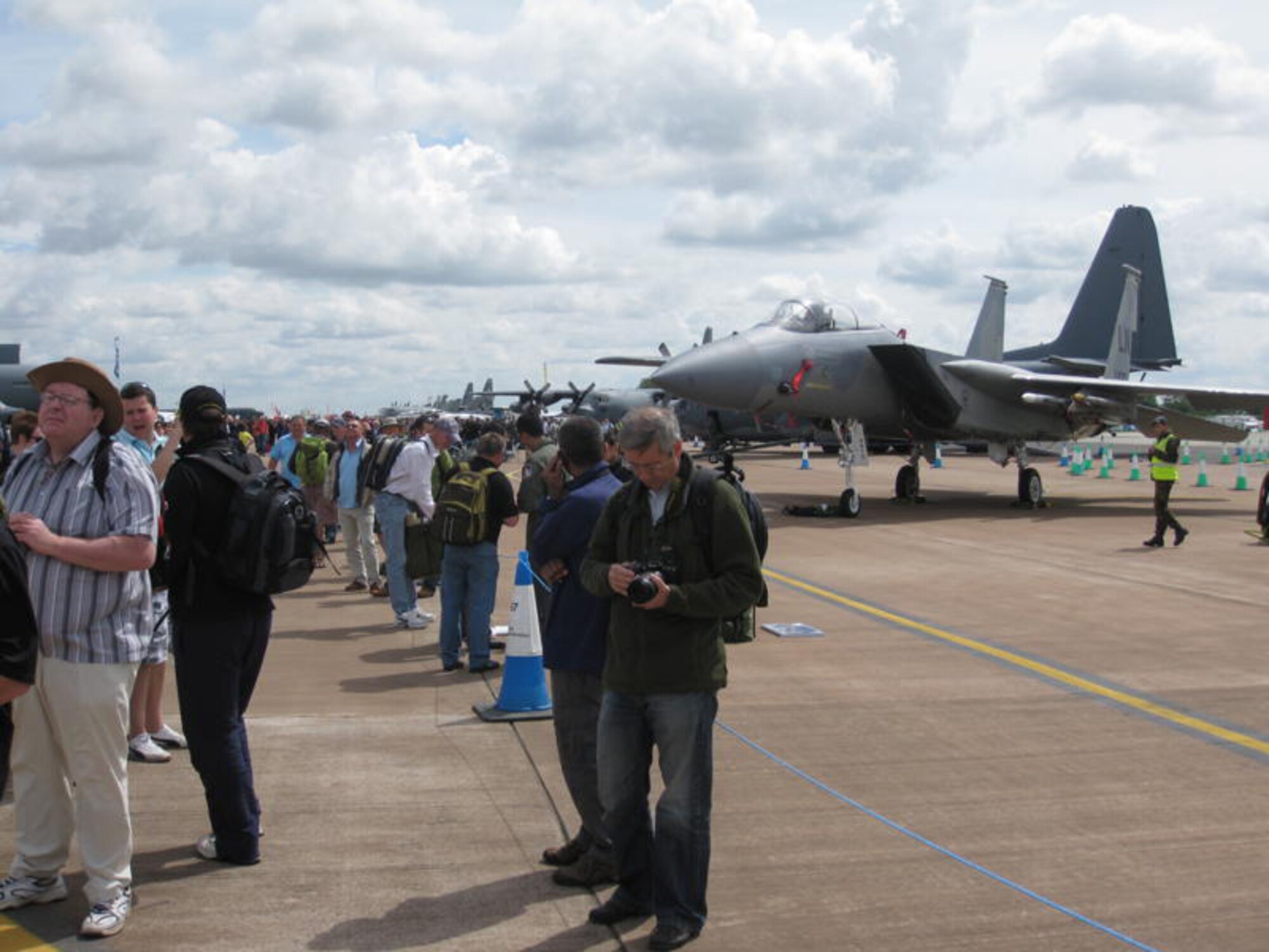Visitors of the Royal International Air Tattoo take photos of an F-15 Eagle based out of RAF Lakenheath, United Kingdom, July 17, 2010. RIAT is being held at RAF Fairford and boast itself as "the world's largest military airshow."  (U.S. Air Force photo/Chief Master Sgt. Greg Wade) 