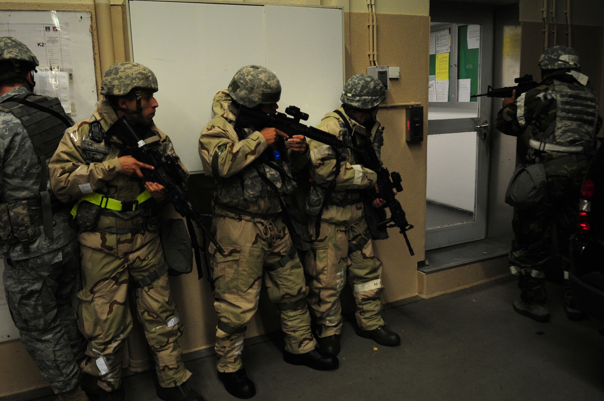 U.S. Air Force Airmen of the 86th Security Forces Squadron respond to a simulated hostile situation during an operational readiness exercise, Ramstein Air Base, Germany, July 17, 2010. An ORE incorporates a series of scenarios to evaluate a base's ability to execute operational duties under simulated wartime conditions. (U.S. Air Force photo by Airman 1st Class Desiree Esposito)