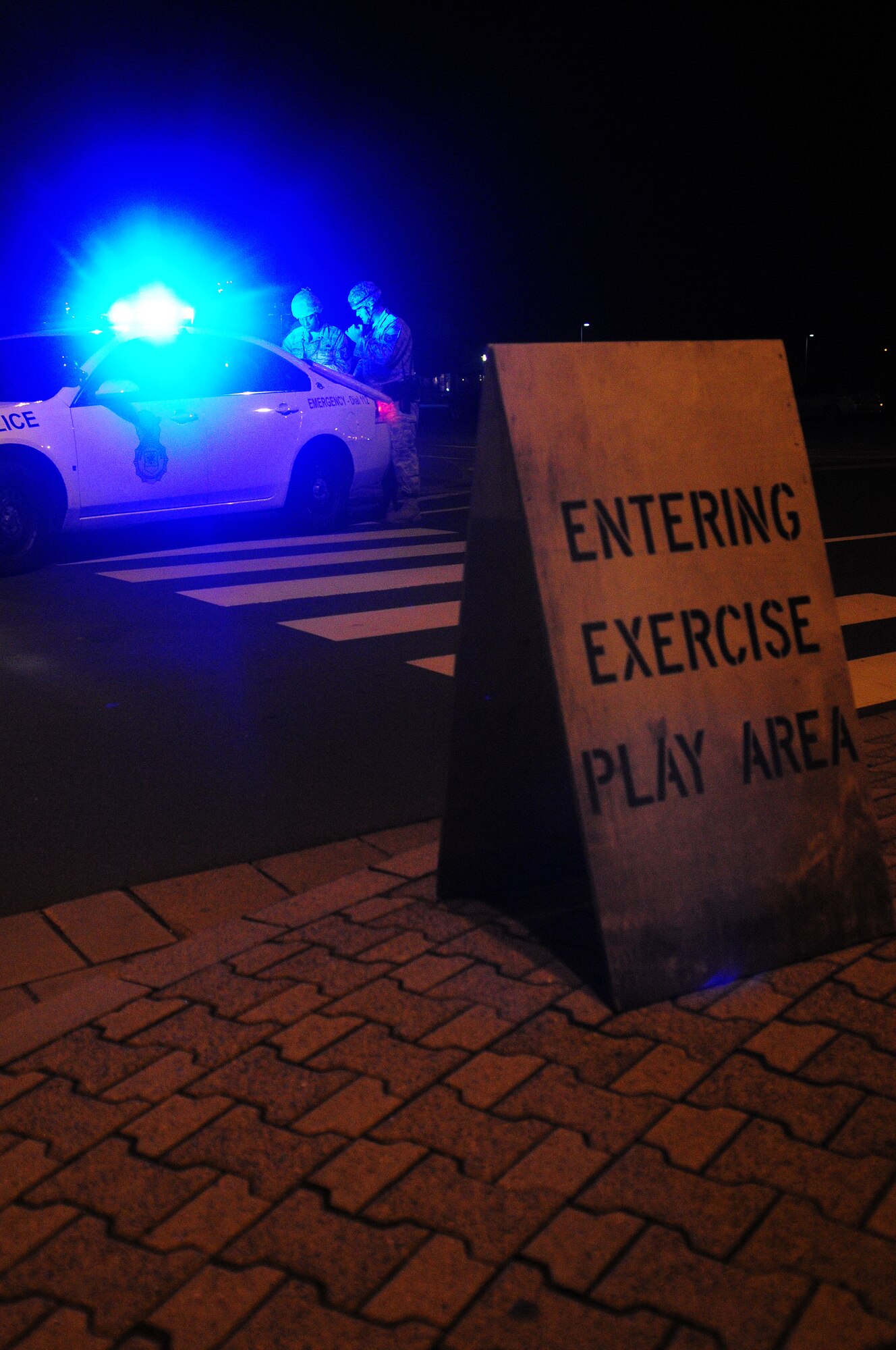 U.S. Air Force members of the 86th Security Forces Squadron provide emergency response during an operational readiness exercise, Ramstein Air Base, Germany, July 19, 2010. An ORE incorporates a series of scenarios to evaluate a base's ability to execute operational duties under simulated wartime conditions. (U.S. Air Force photo by Airman 1st Class Desiree Esposito)